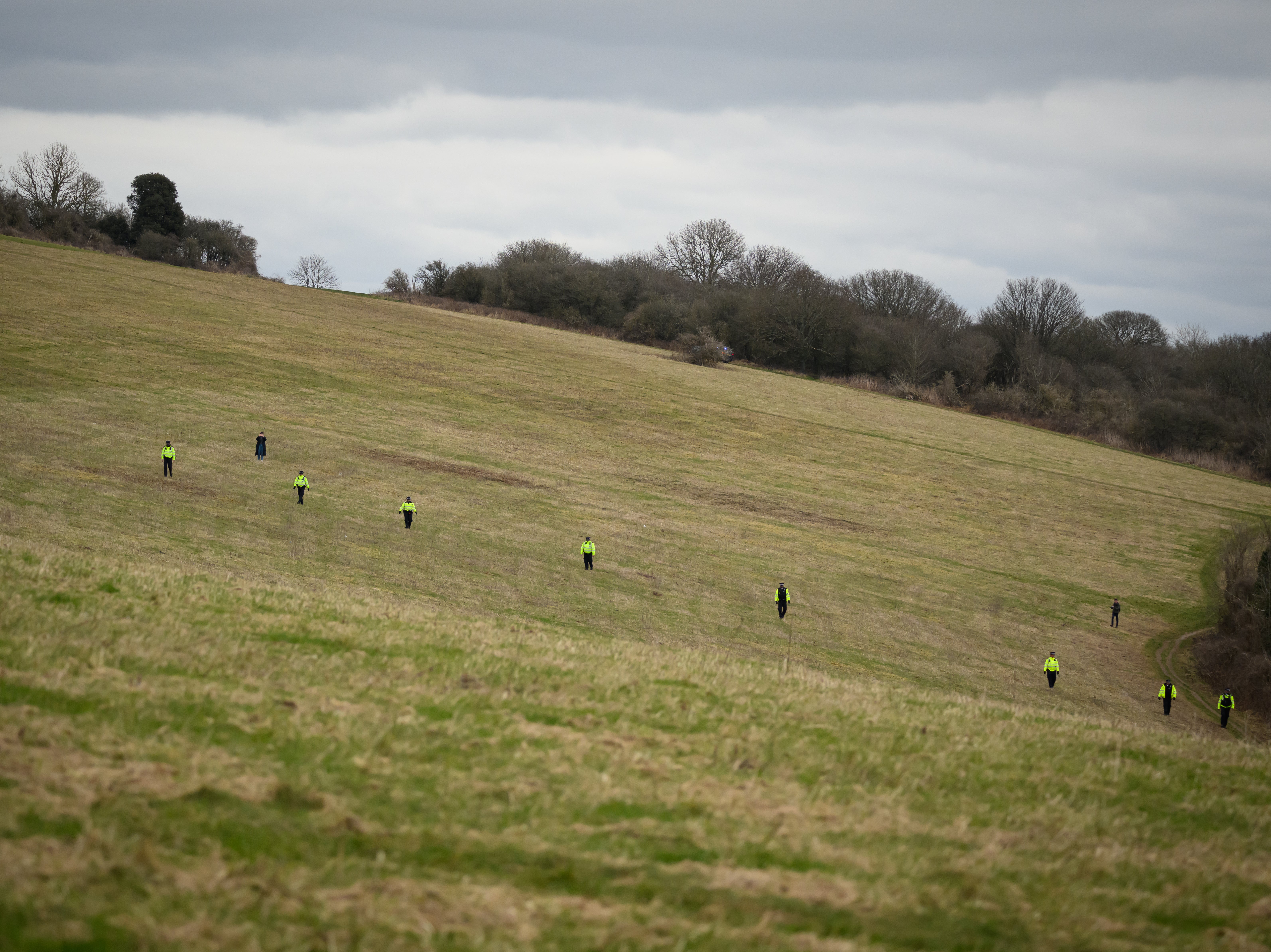 Police pictured searching for Victoria in March 2023