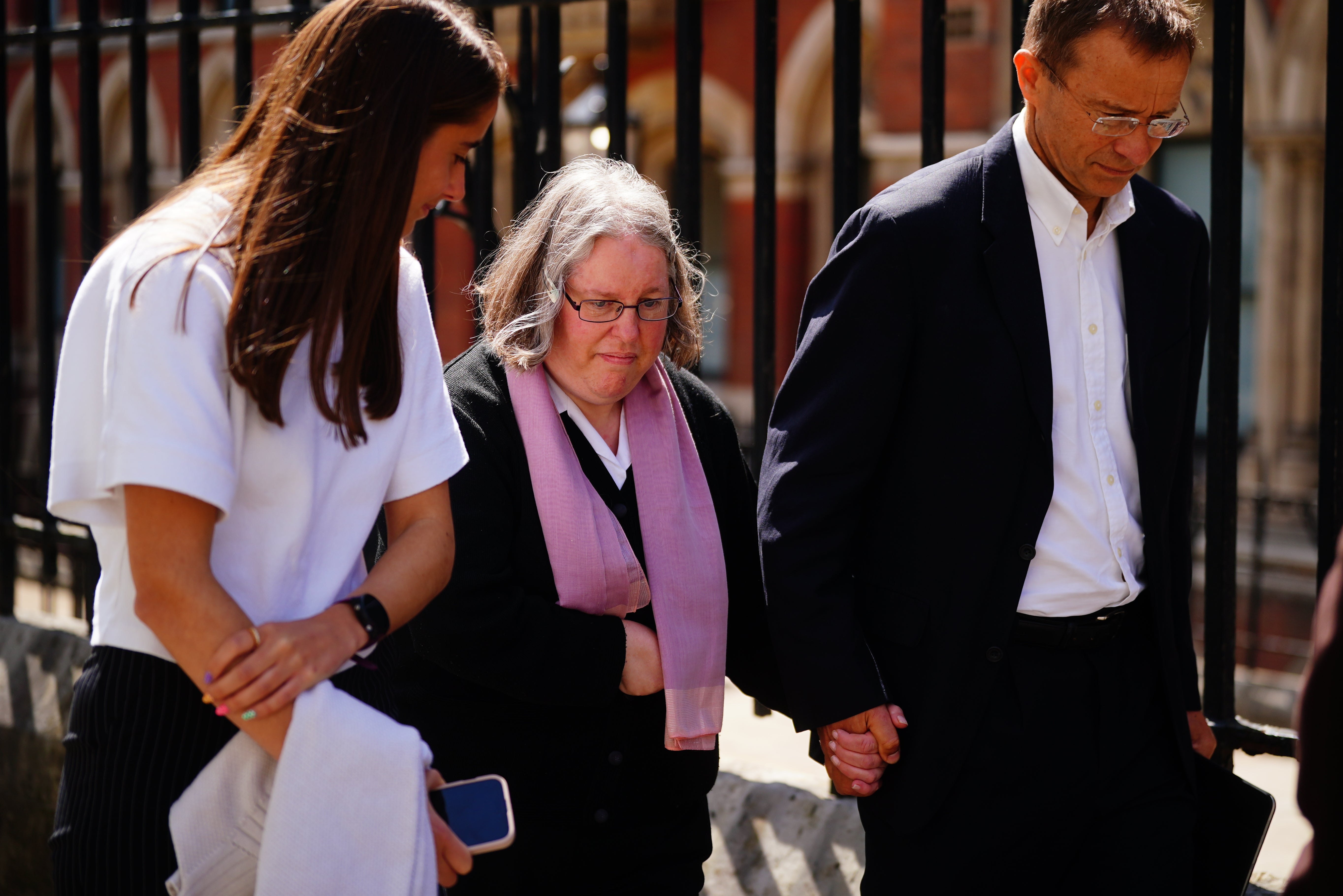 Auriol Grey, who shouted and waved at a cyclist causing her to fall into the path of an oncoming car, leaving the Royal Courts of Justice in London on Wednesday