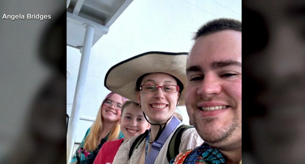 Aiden Bridges, second from left, seen with his family including mom Angela