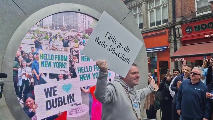 Wholesome placards can be seen on the New York side