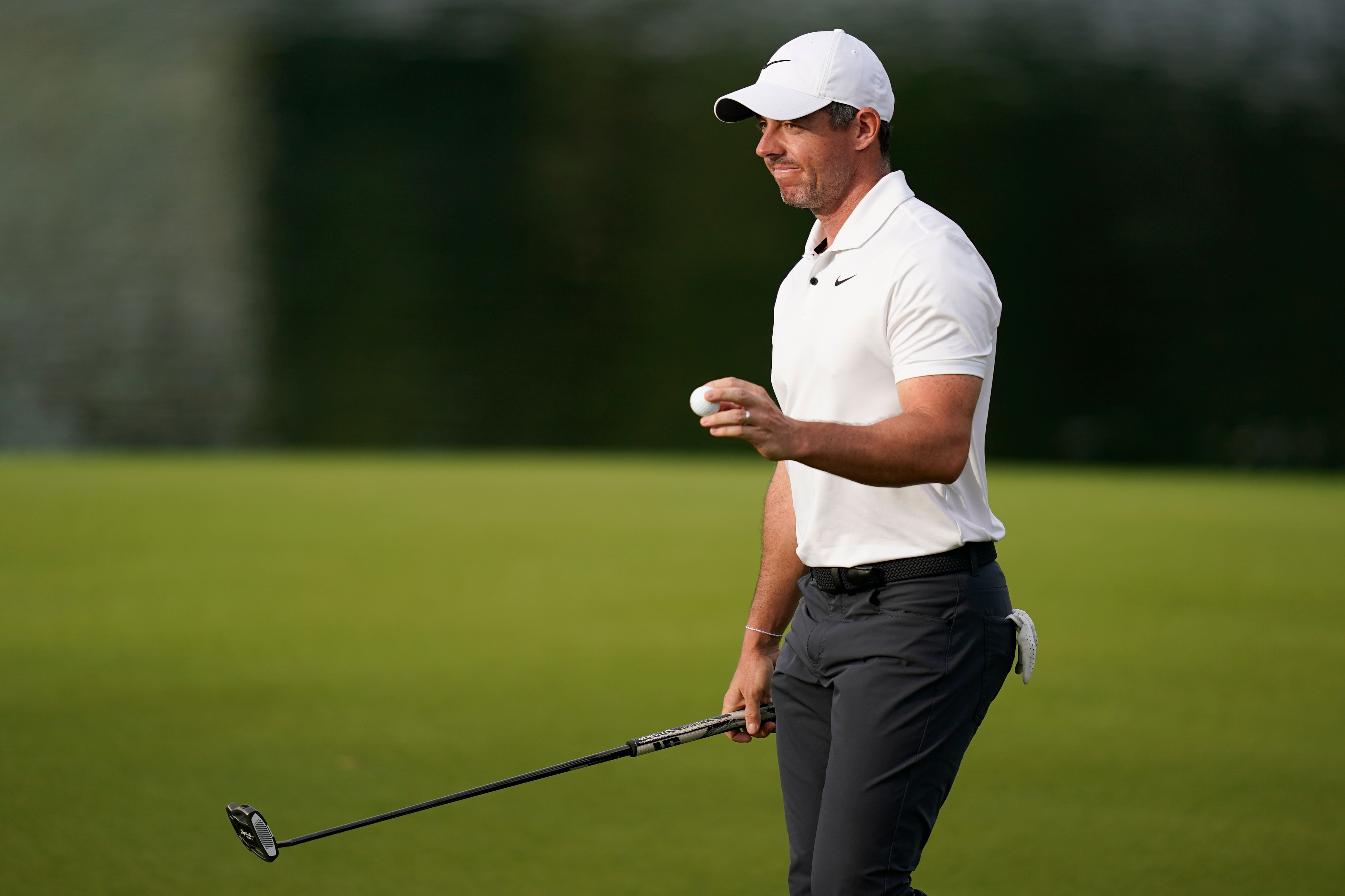 Rory McIlroy, of Northern Ireland, waves after making a putt on the 17th hole during the first round of the Wells Fargo Championship golf tournament at Quail Hollow on Thursday, May 9, 2024, in Charlotte, North Carolina (Erik Verduzco/AP)