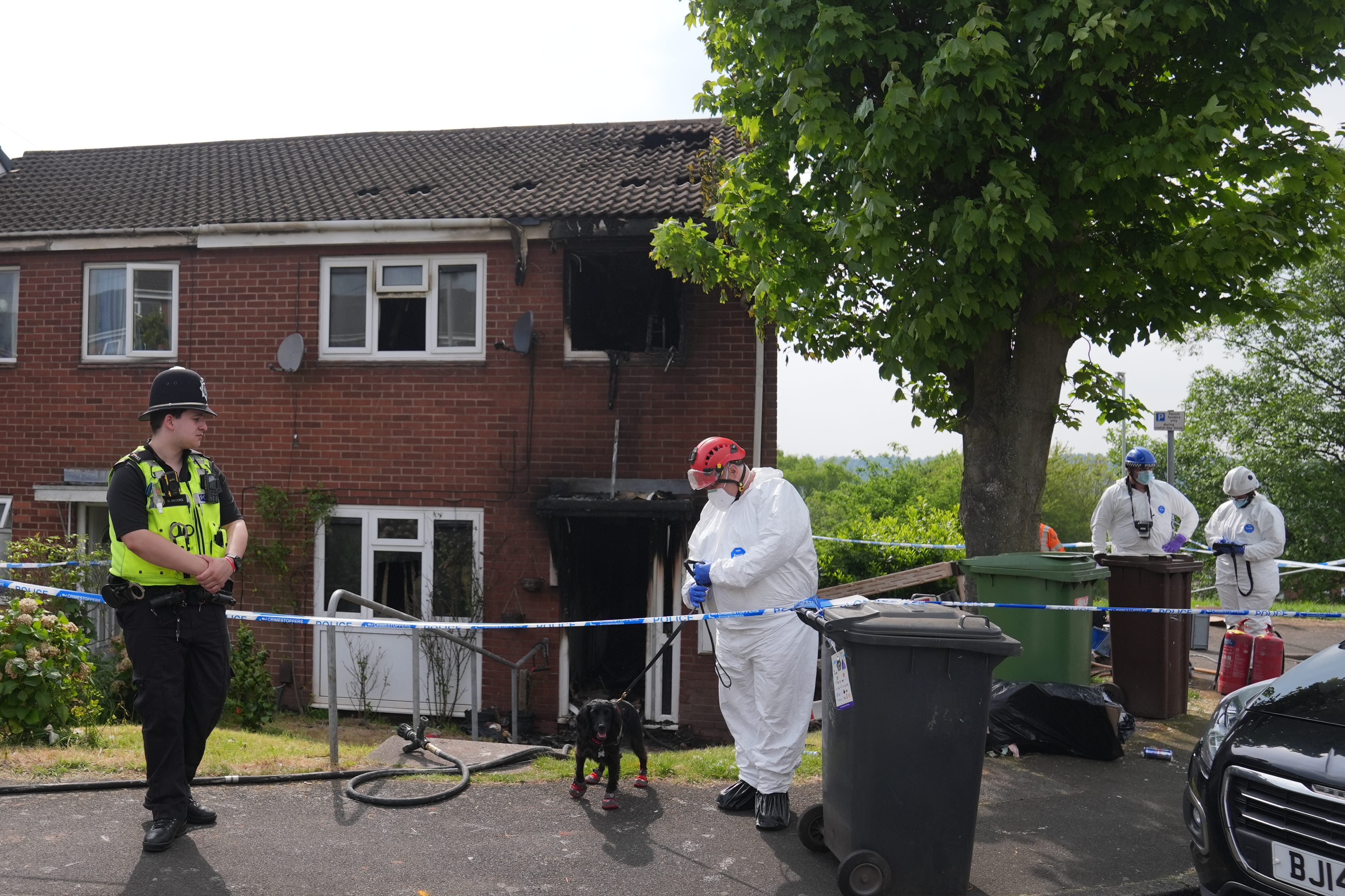 Police and forensic officers at the scene in Dunstall Hill area of Wolverhampton (Jacob King/PA)