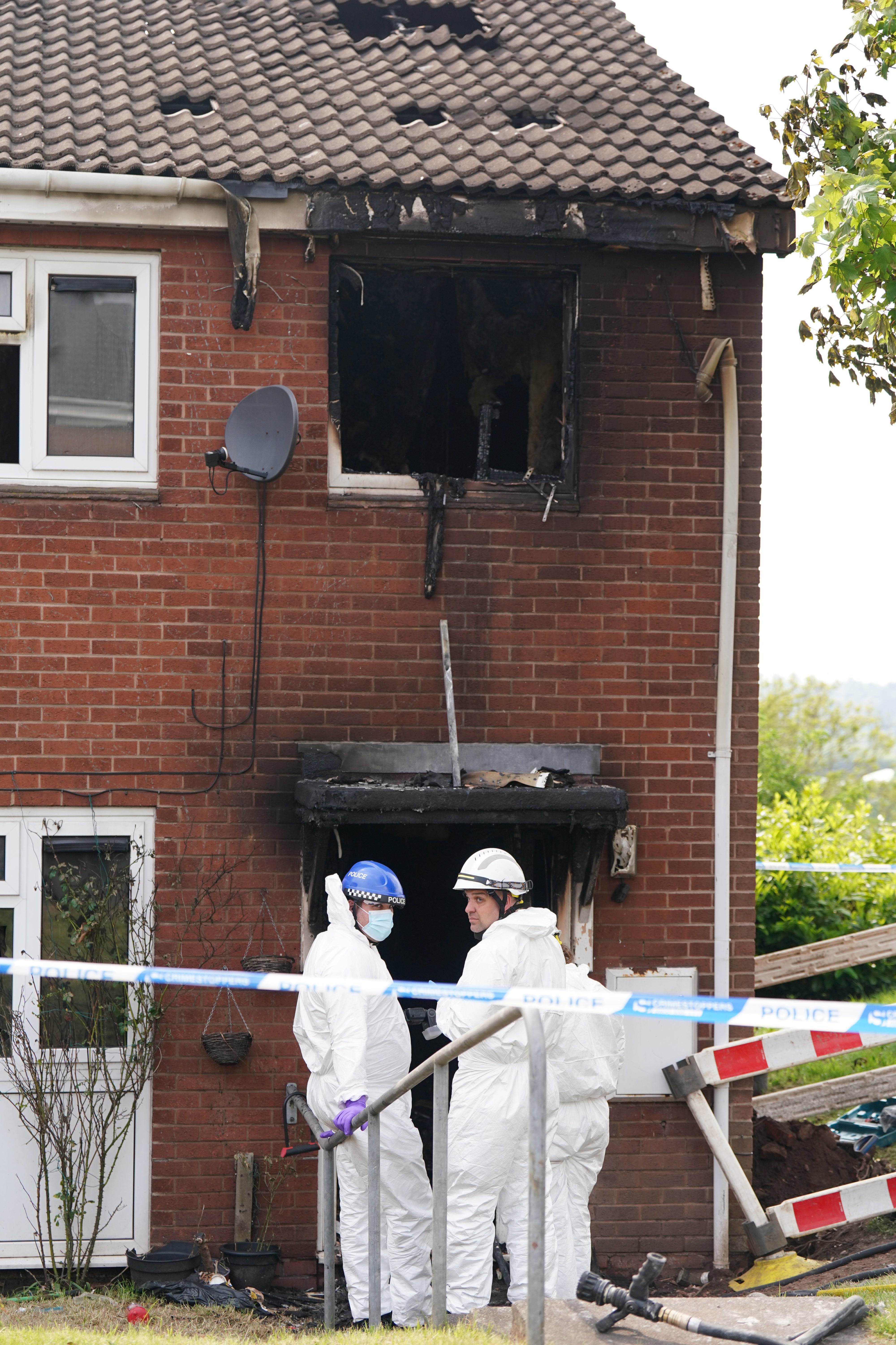 West Midlands Police said they arrested two men on suspicion of murder after the house fire