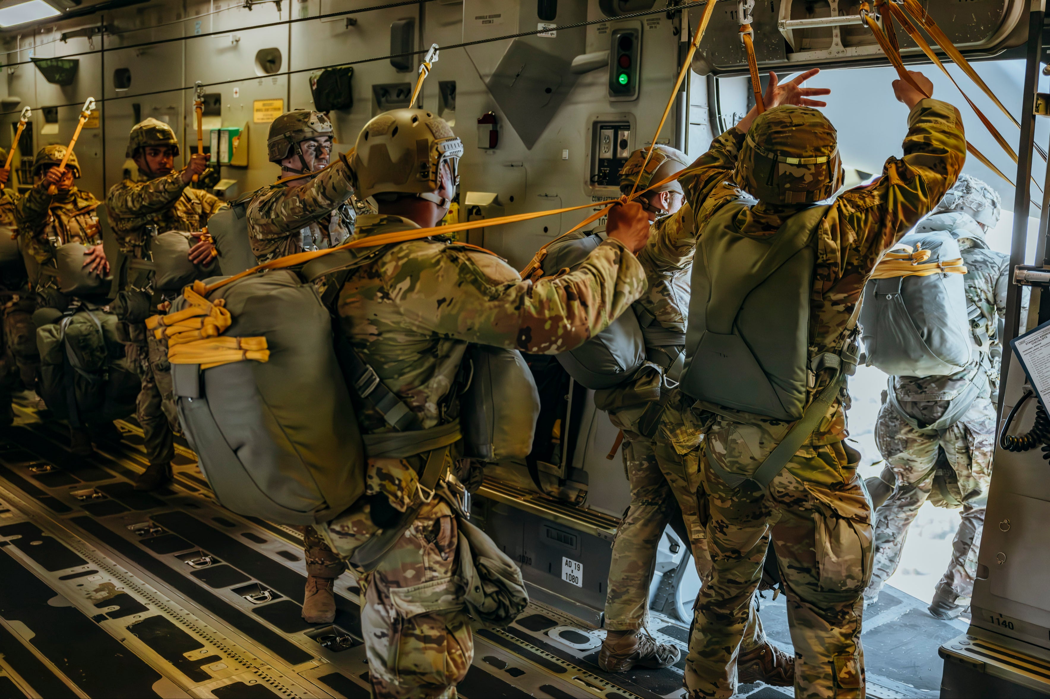 British and American airborne paratroopers jump out of the C17