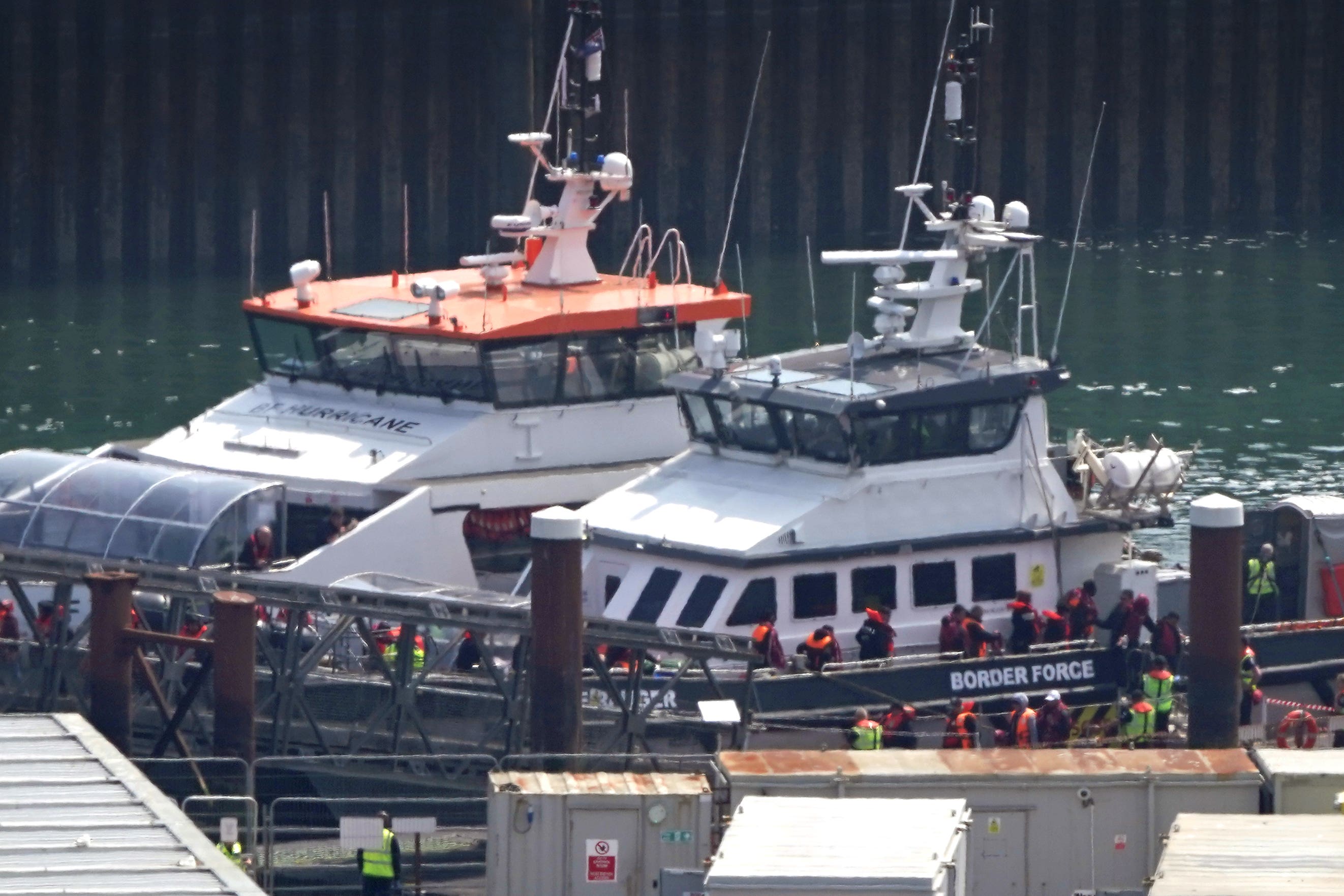 A group of people thought to be migrants are brought in to Dover (Gareth Fuller/PA)