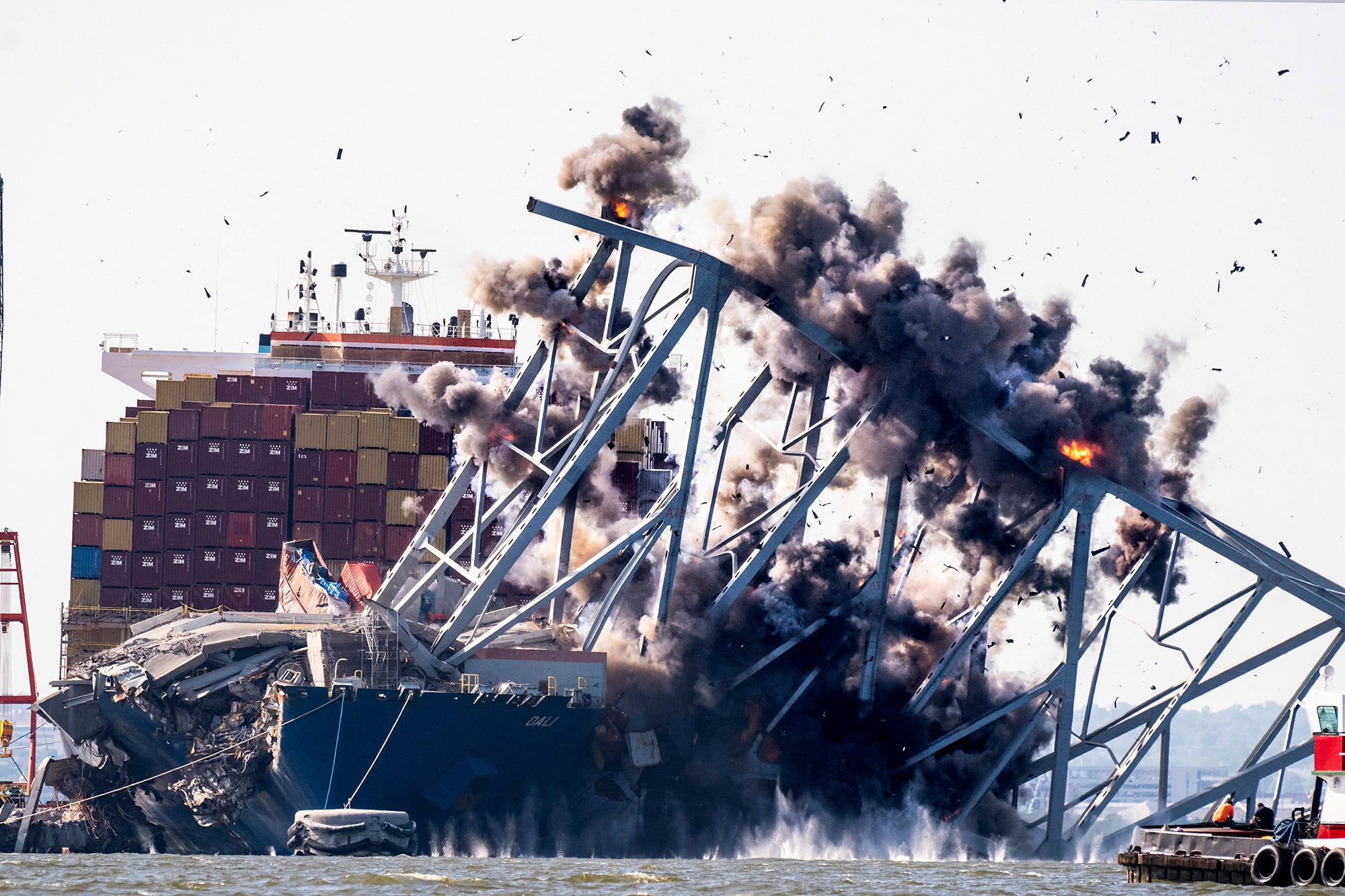 A section of the Francis Scott Key Bridge is demolished