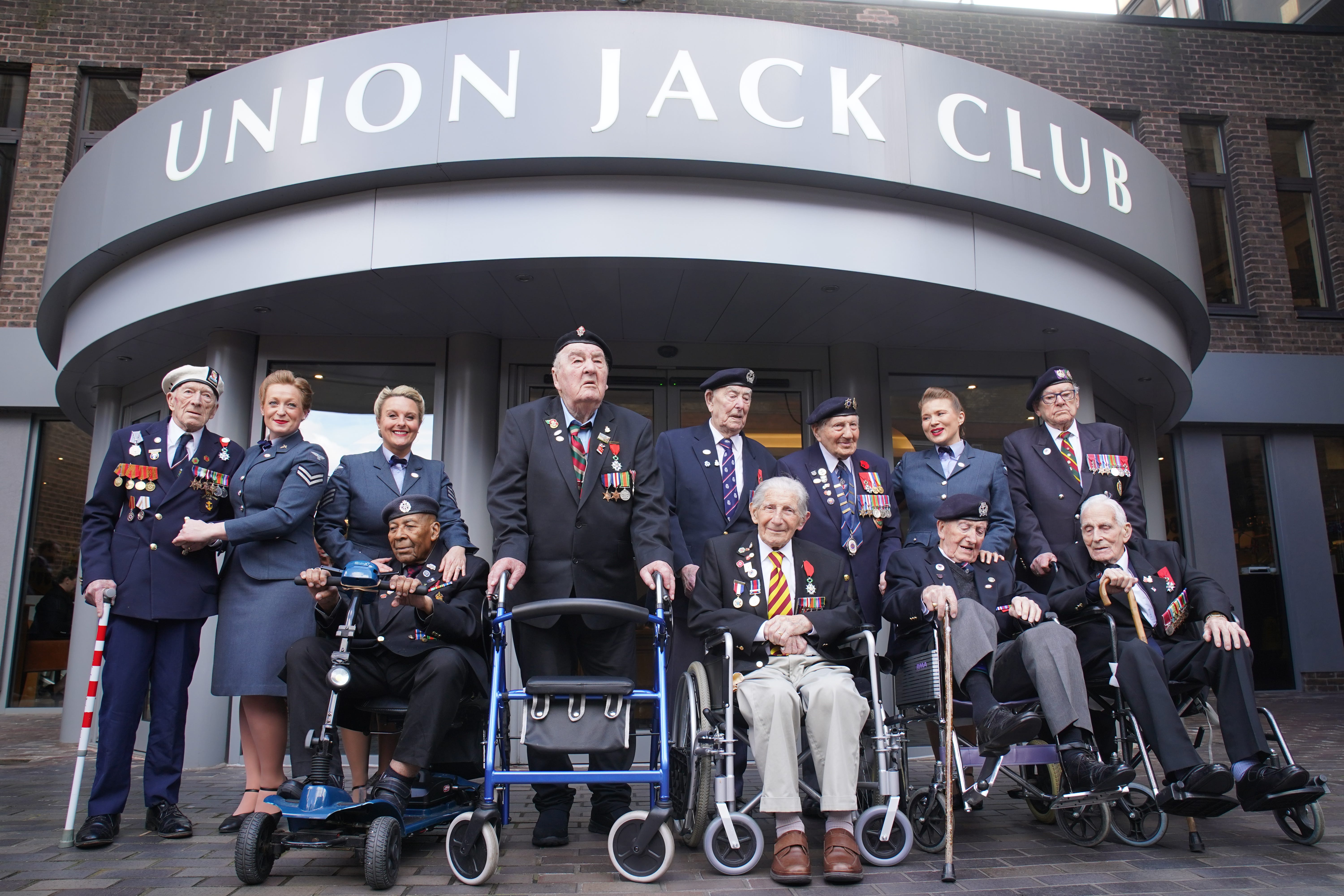 D-Day and Normandy veterans (left to right) Alec Penstone, 98, Gilbert Clarke, 98, Richard Aldred, 99, Henry Rice, 98, Donald Howkins, 103, Mervyn Kersh, 98, Stan Ford, 98, Ken Hay, 98, and John Dennett, 99 (Gareth Fuller/PA)