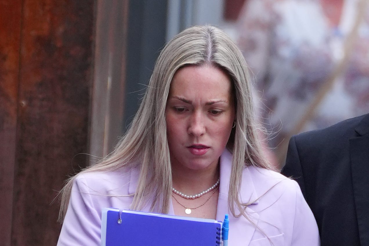 School teacher Rebecca Joynes arrives at Manchester Crown Court, where she is charged with six counts of sexual activity with two teenagers, including two counts of sexual activity while being a teacher in a position of trust (Peter Byrne/PA)