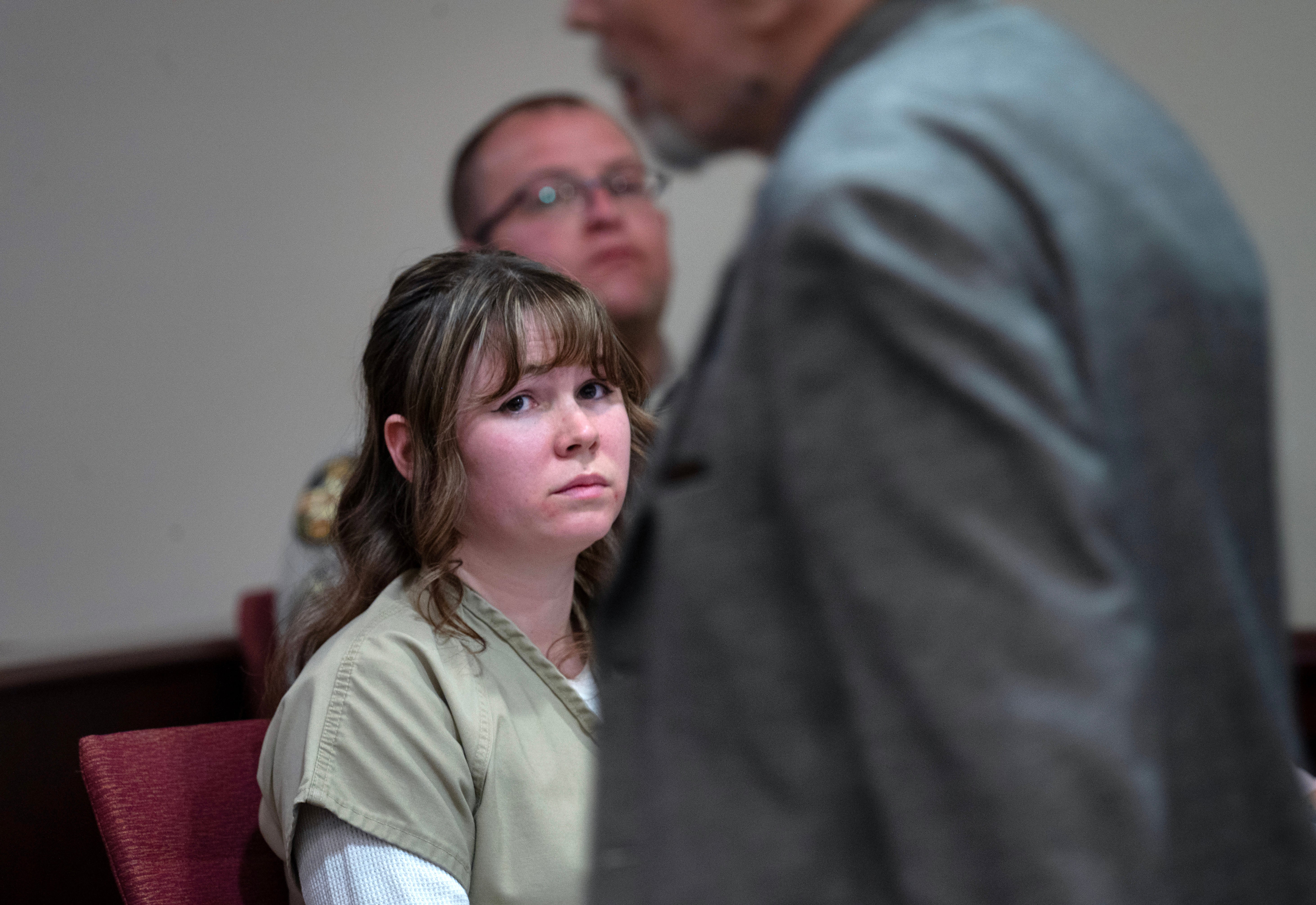 Hannah Gutierrez Reed watches her father Thell Reed leave the podium after he asked the judge not impose prison time on his daughter in First District Court, on April 15, 2024 in Santa Fe, New Mexico