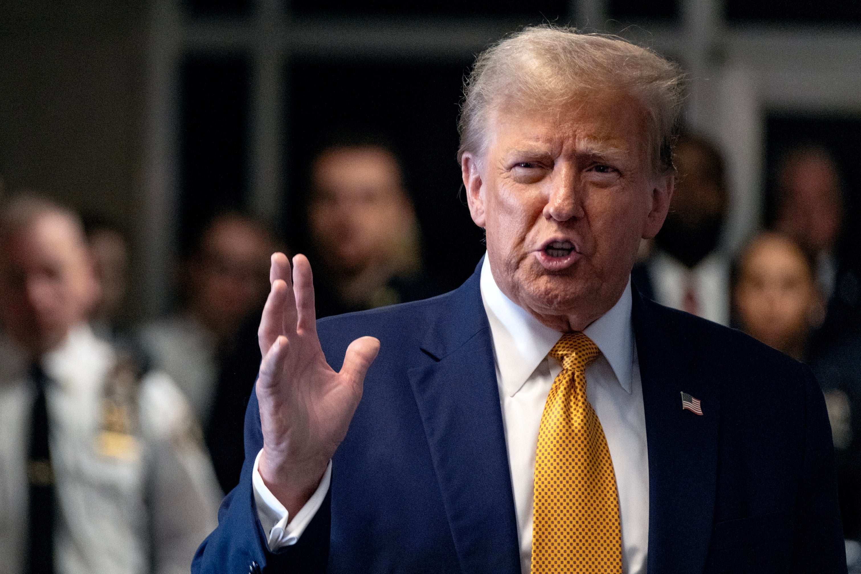 Donald Trump outside the courtroom on 14 May