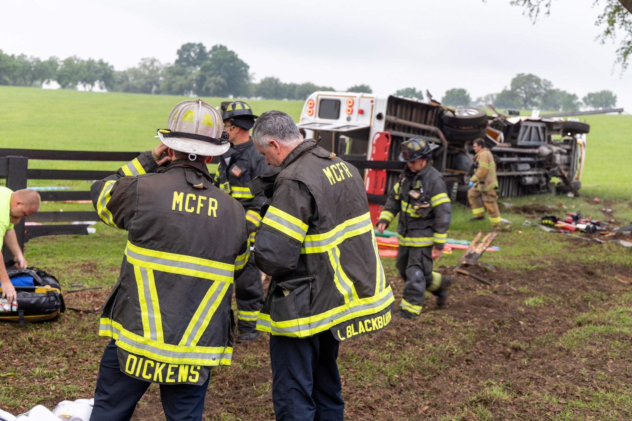 Investigators assess the scene of a fatal bus crash which killed at least eight migrant workers in Florida on Tuesday 14 May 2024