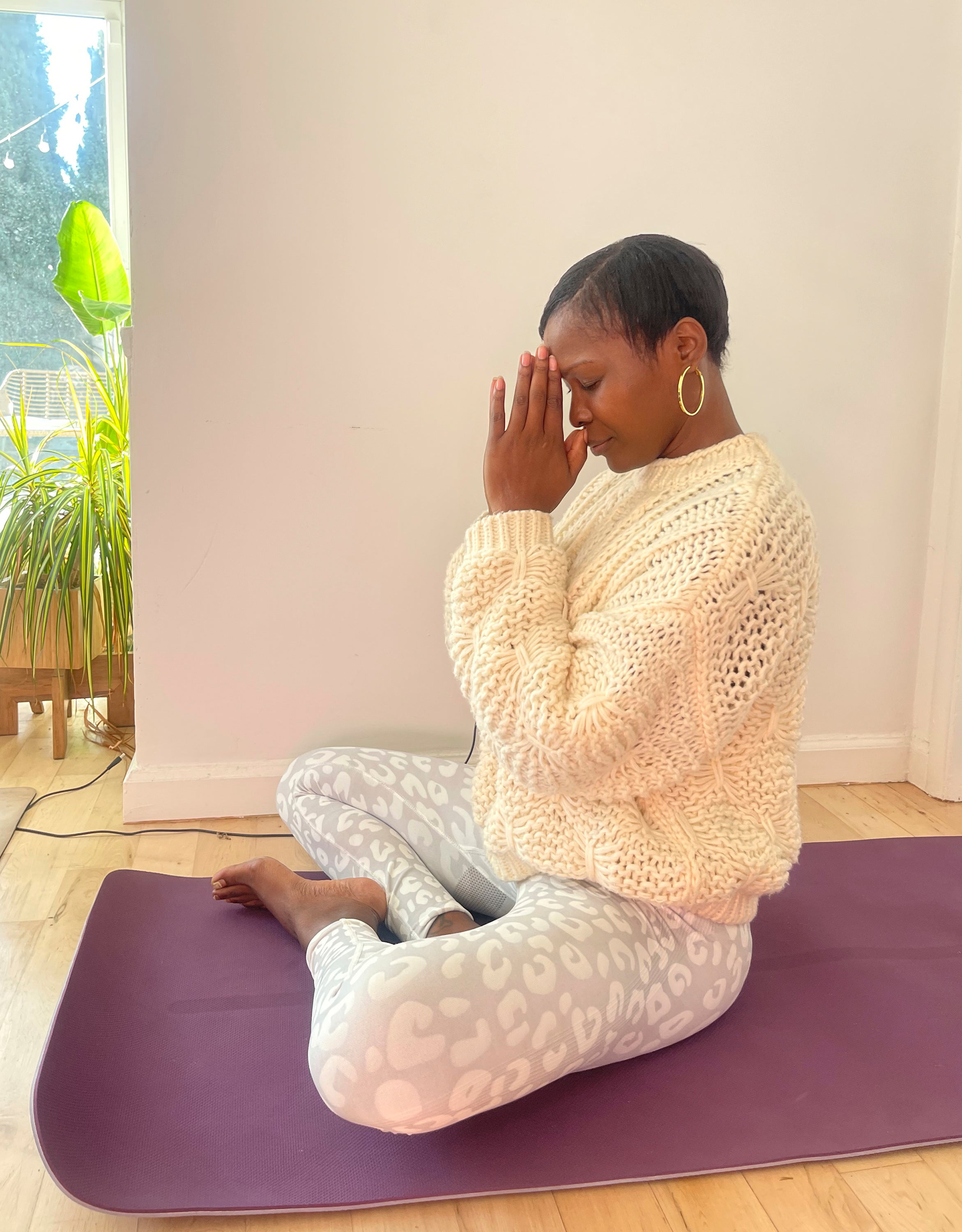 Marcelle Hutchins meditates in her studio in West Hollywood