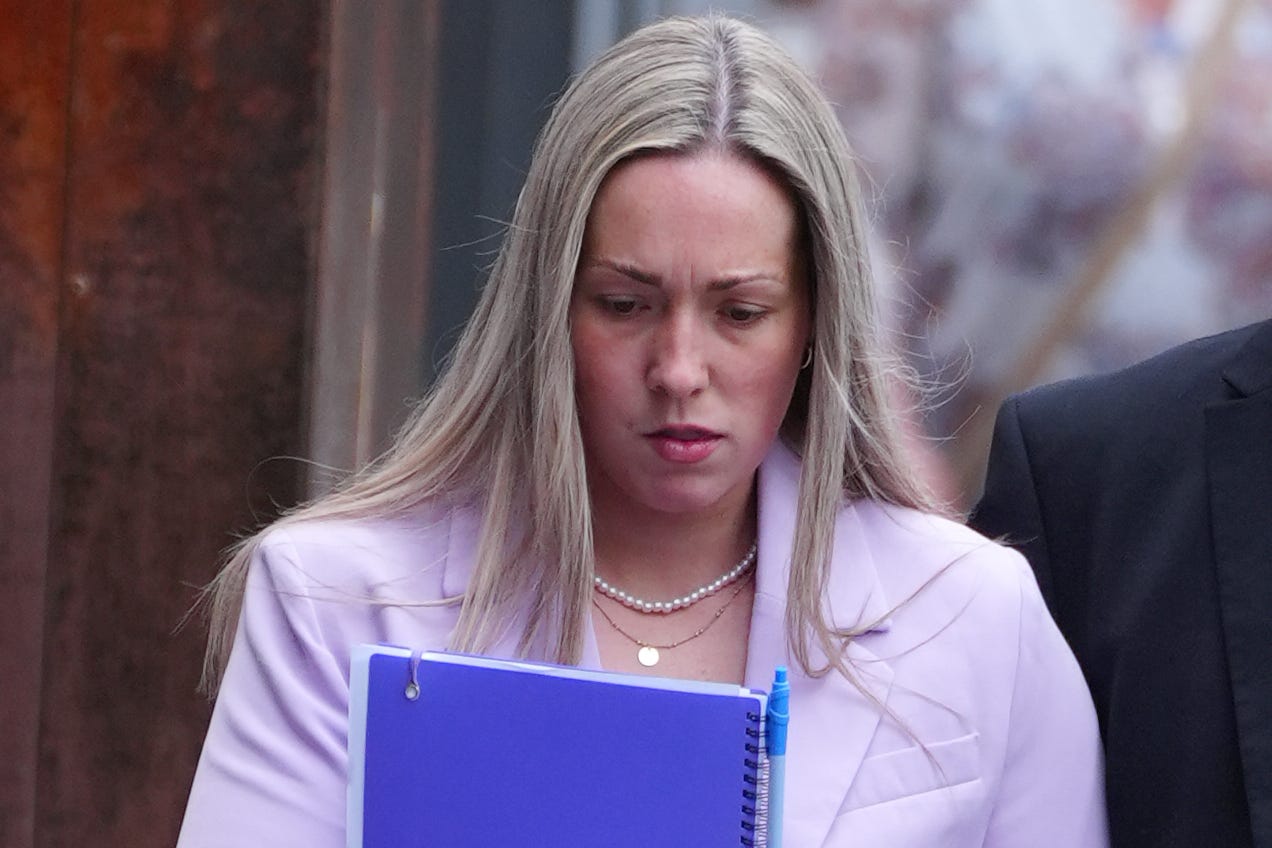 School teacher Rebecca Joynes arrives at Manchester Crown Court, where she is charged with six counts of sexual activity with two teenagers, including two counts of sexual activity while being a teacher in a position of trust (PA)