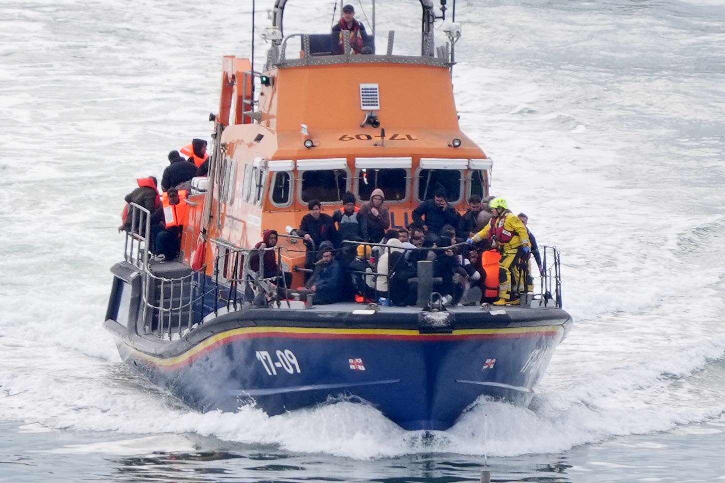 A group of people thought to be migrants are brought in to Dover, Kent (Gareth Fuller/PA)