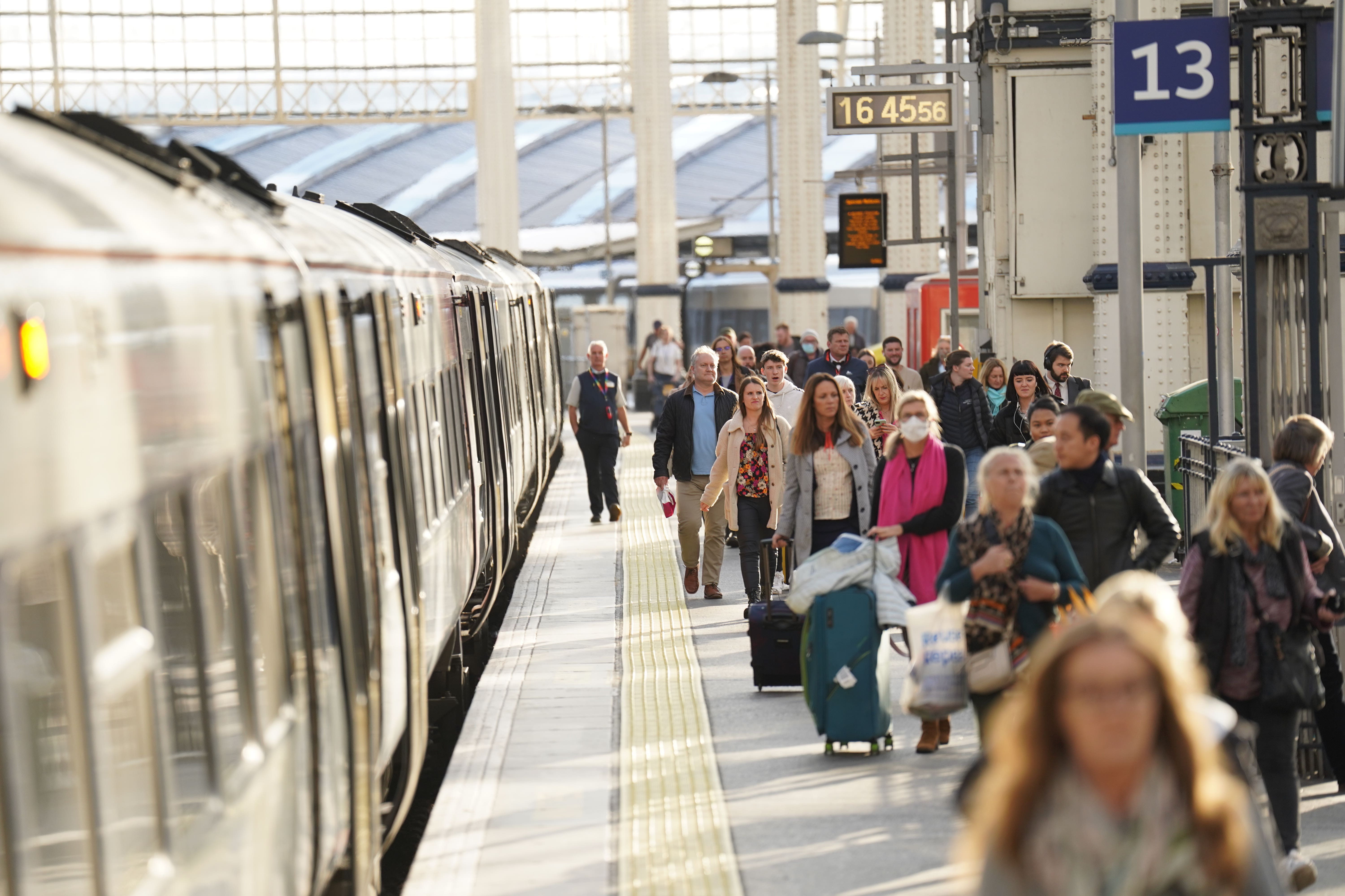 Passengers at Waterloo Station in London (James Manning/PA)