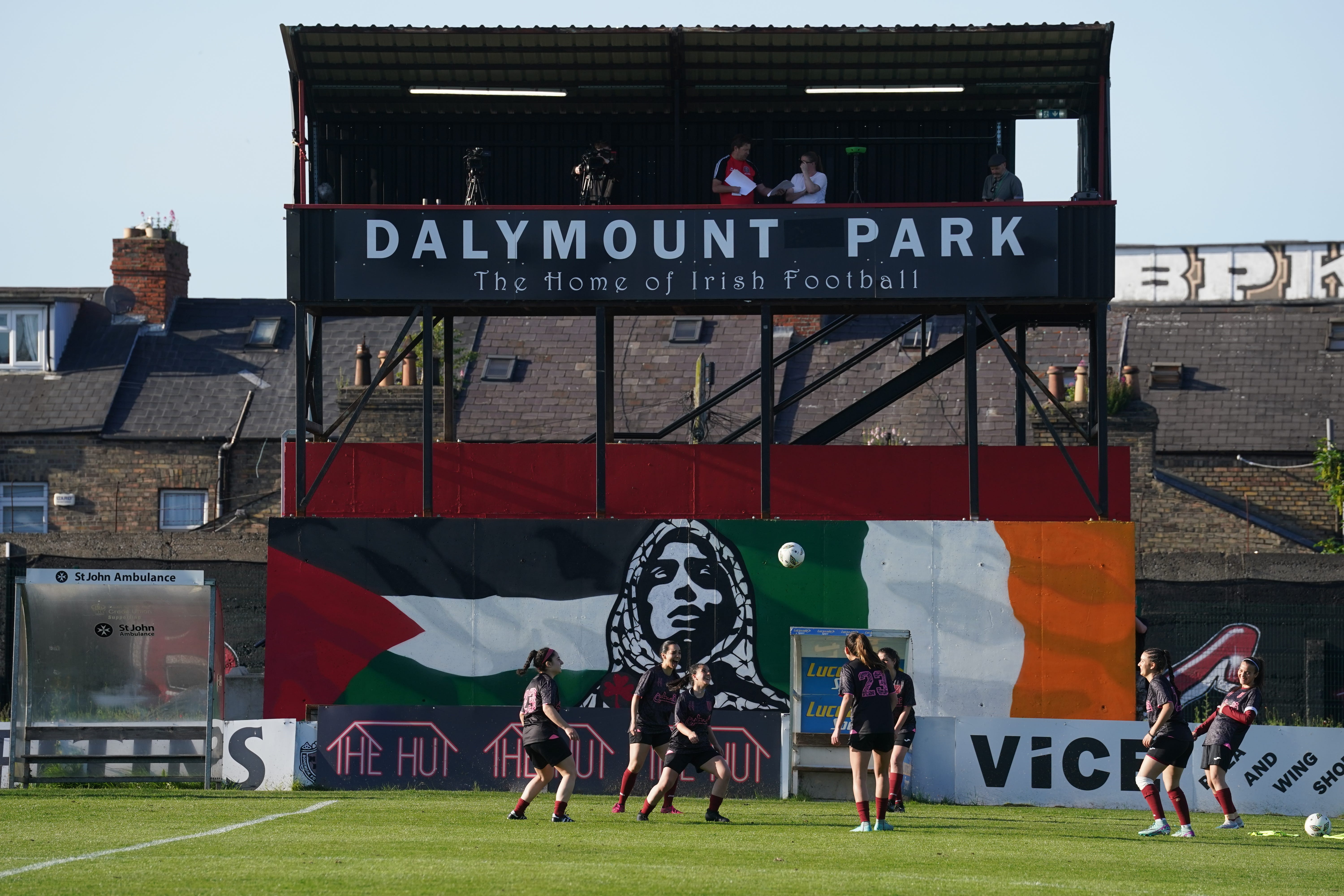 Players from the Palestine women national team warm up for their friendly match at Dalymount Park in Dublin against Bohemians Women (Brian Lawless/PA)