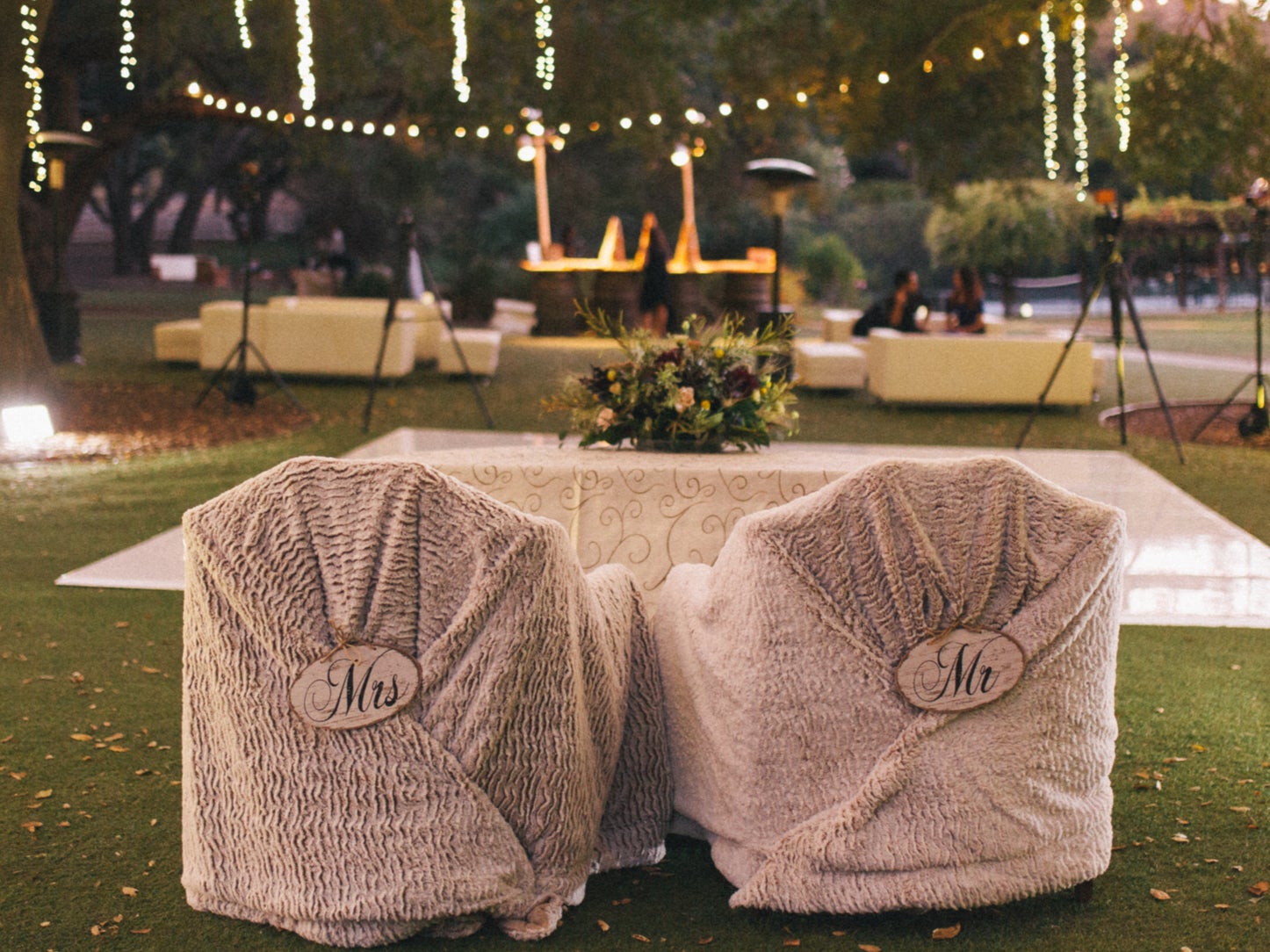 Outdoor wedding reception set up on woods