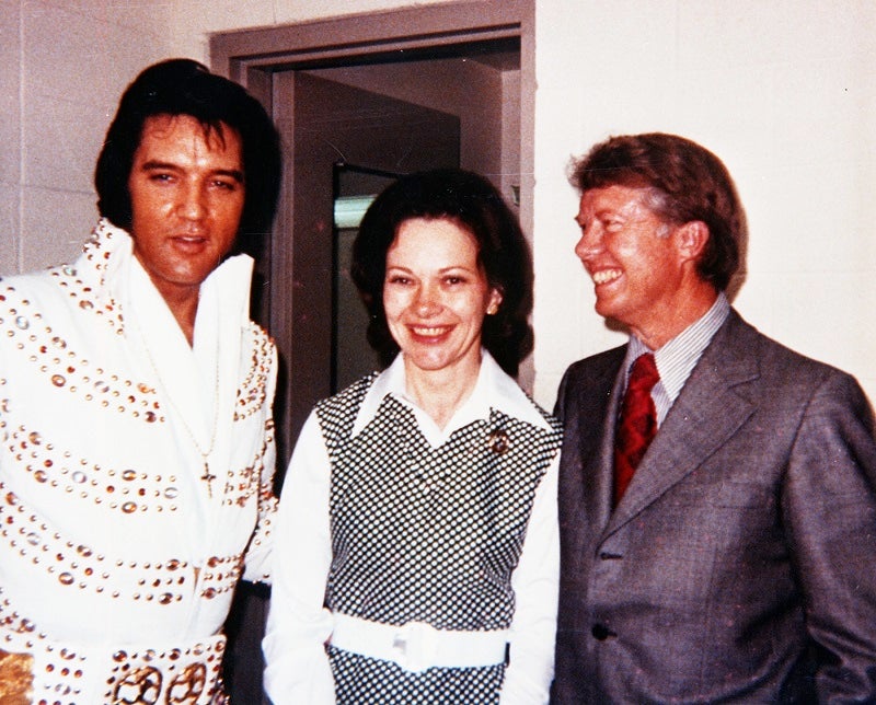 Then-Georgia Governor Jimmy Carter and his wife, Rosalynn, meet with Elvis Presley in 1973 backstage after a concert.