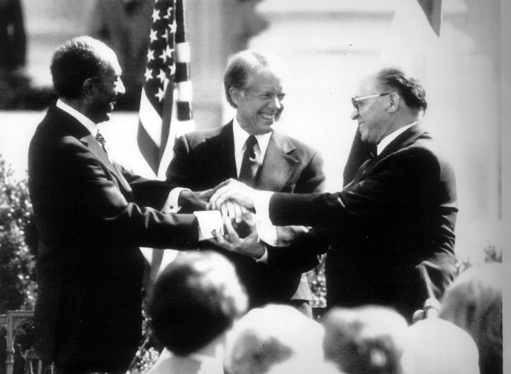 President Jimmy Carter with President Menachem Begin and Anwar Sadat after the signing of a peace treaty between Israel and Egypt