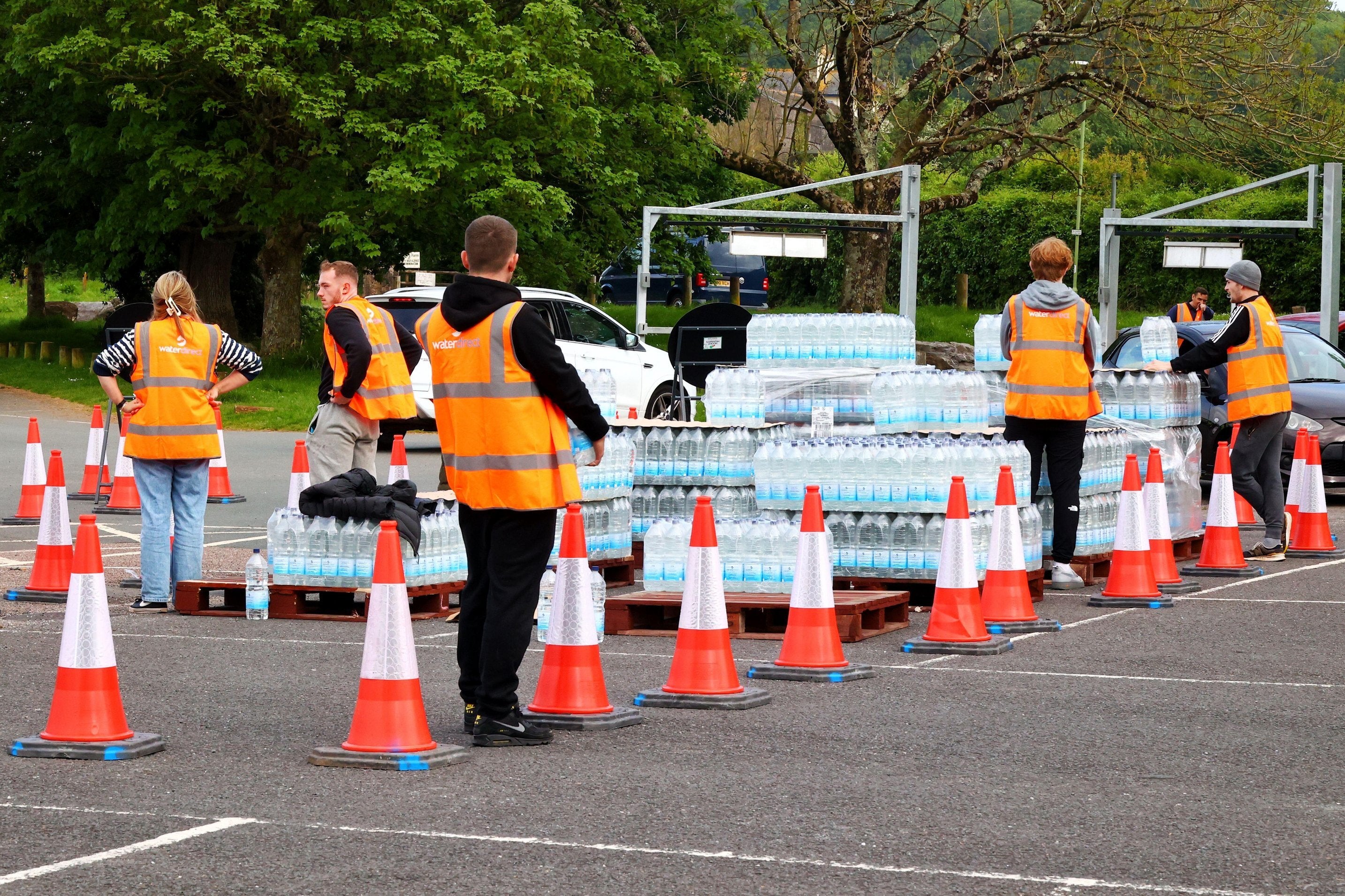 South West Water handed out emergency bottled water in Broadsands Car Park in Brixham