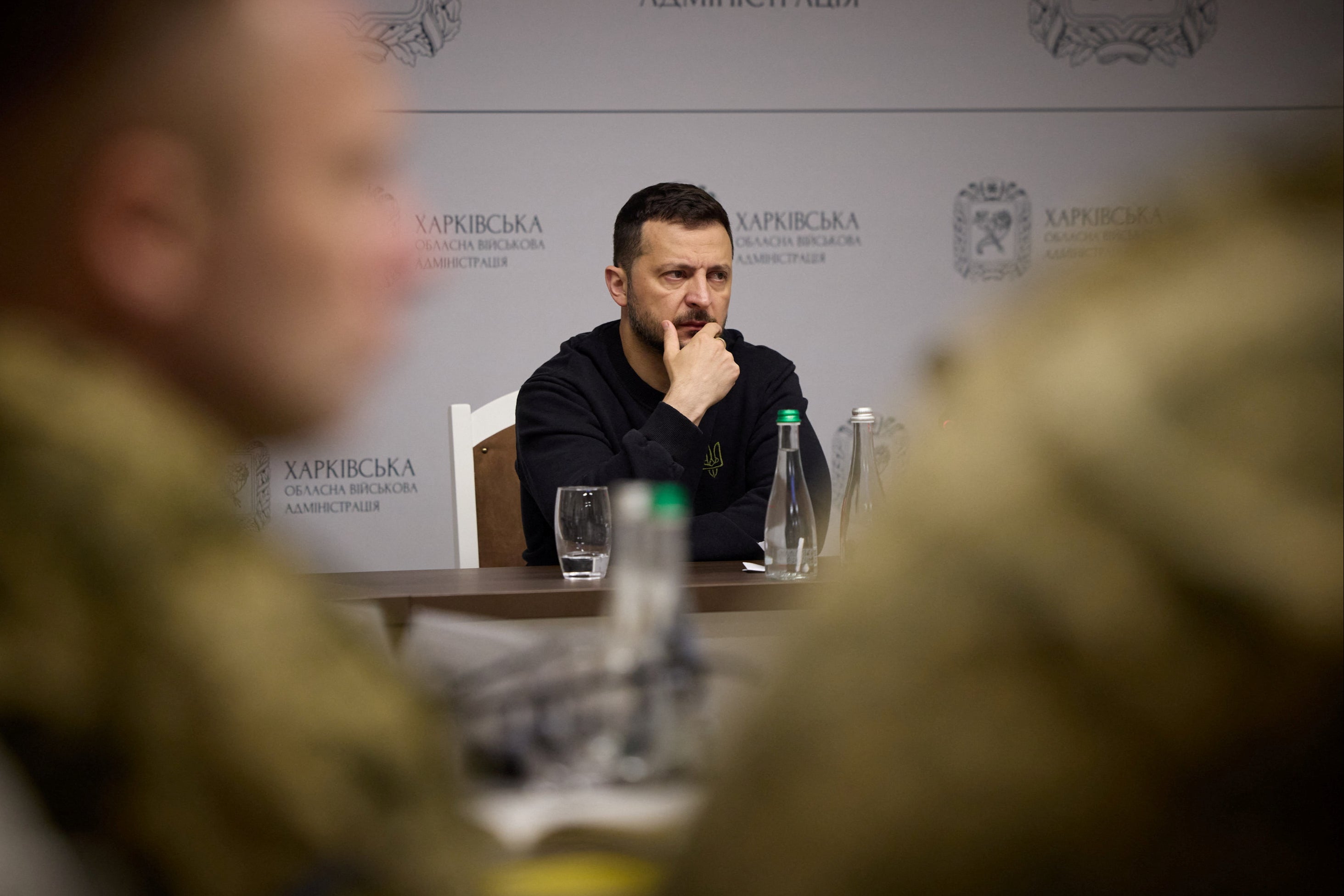 Ukraine’s president Volodymyr Zelensky attends a meeting with top military officials as he visits the Kharkiv region