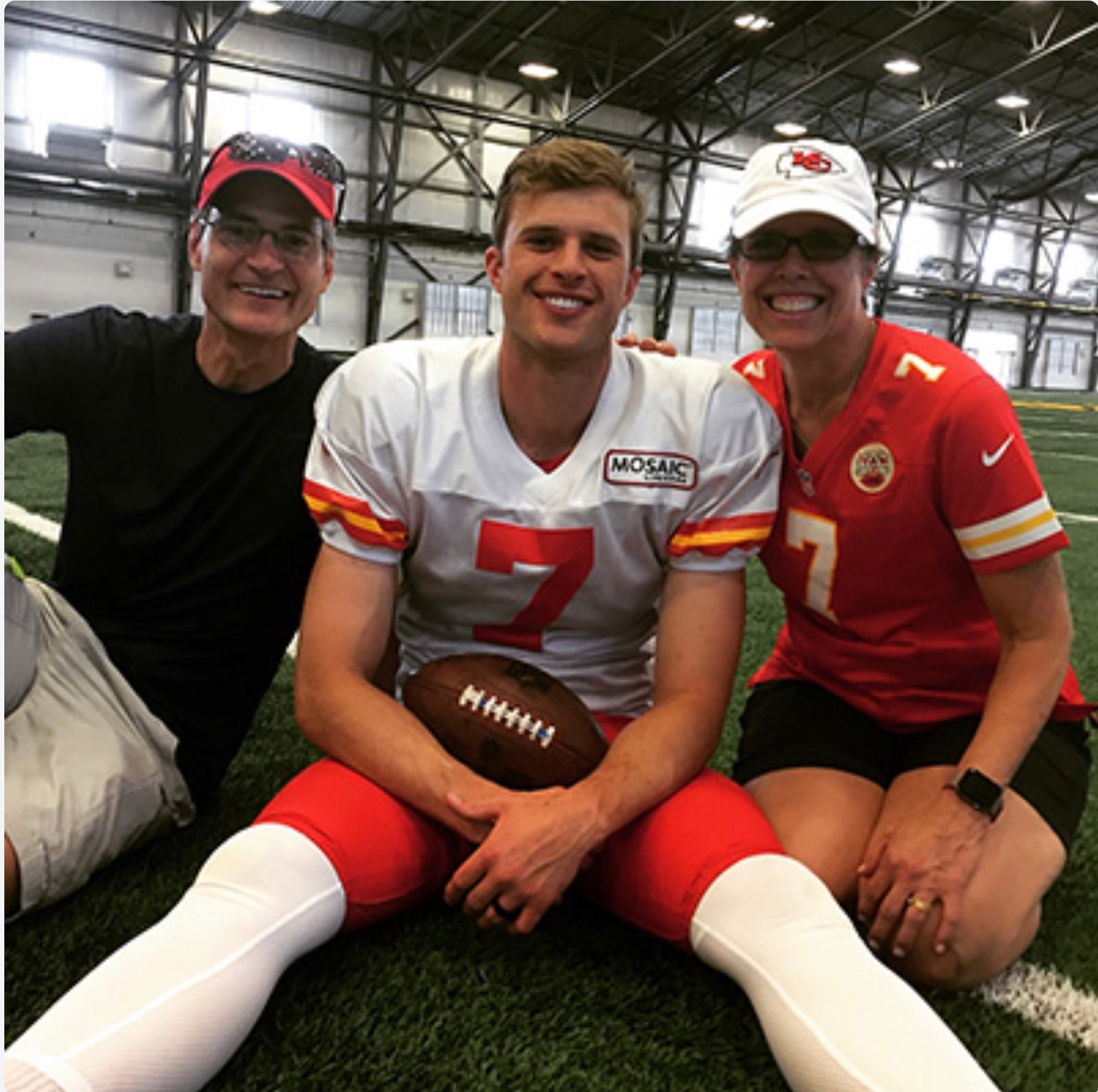 Harrison Butker with his parents Harrison and Elizabeth Butker. Ms Butker is a physicist at Emory University