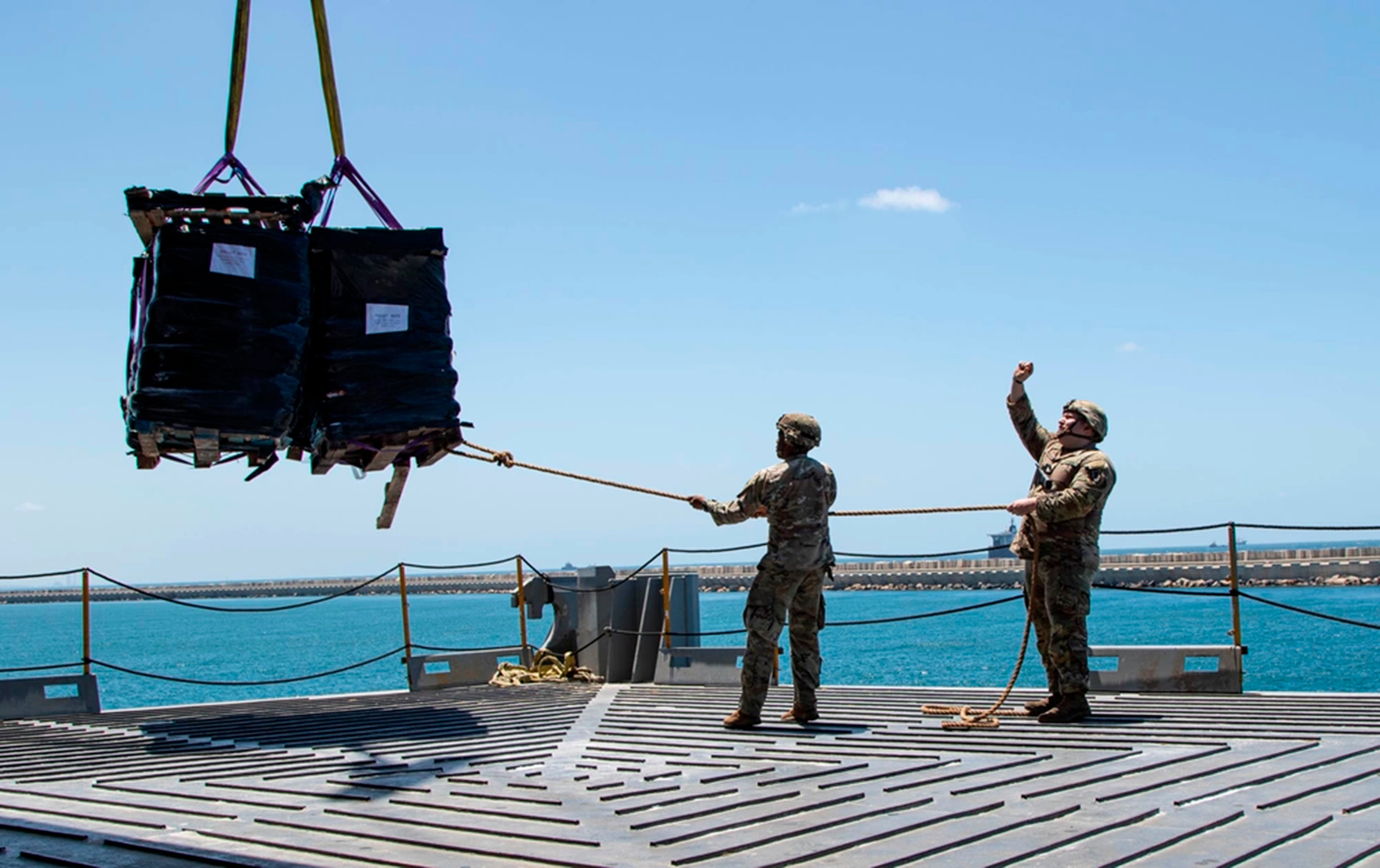 Humanitarian aid arrives at the floating pier off the northern coast of Gaza