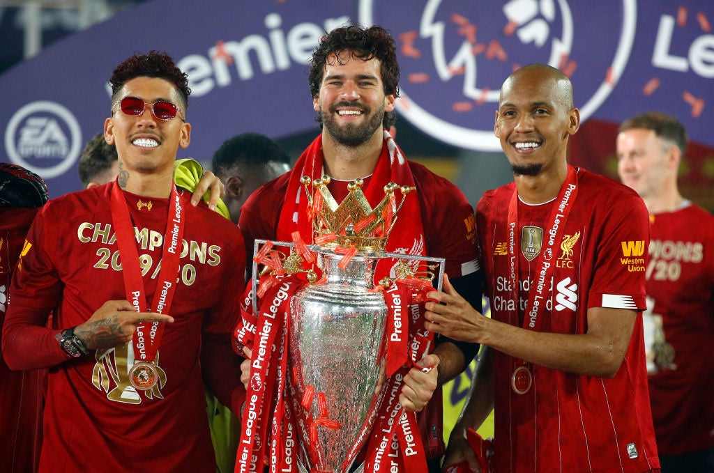 Firmino, Alisson and Fabinho with the Premier League trophy