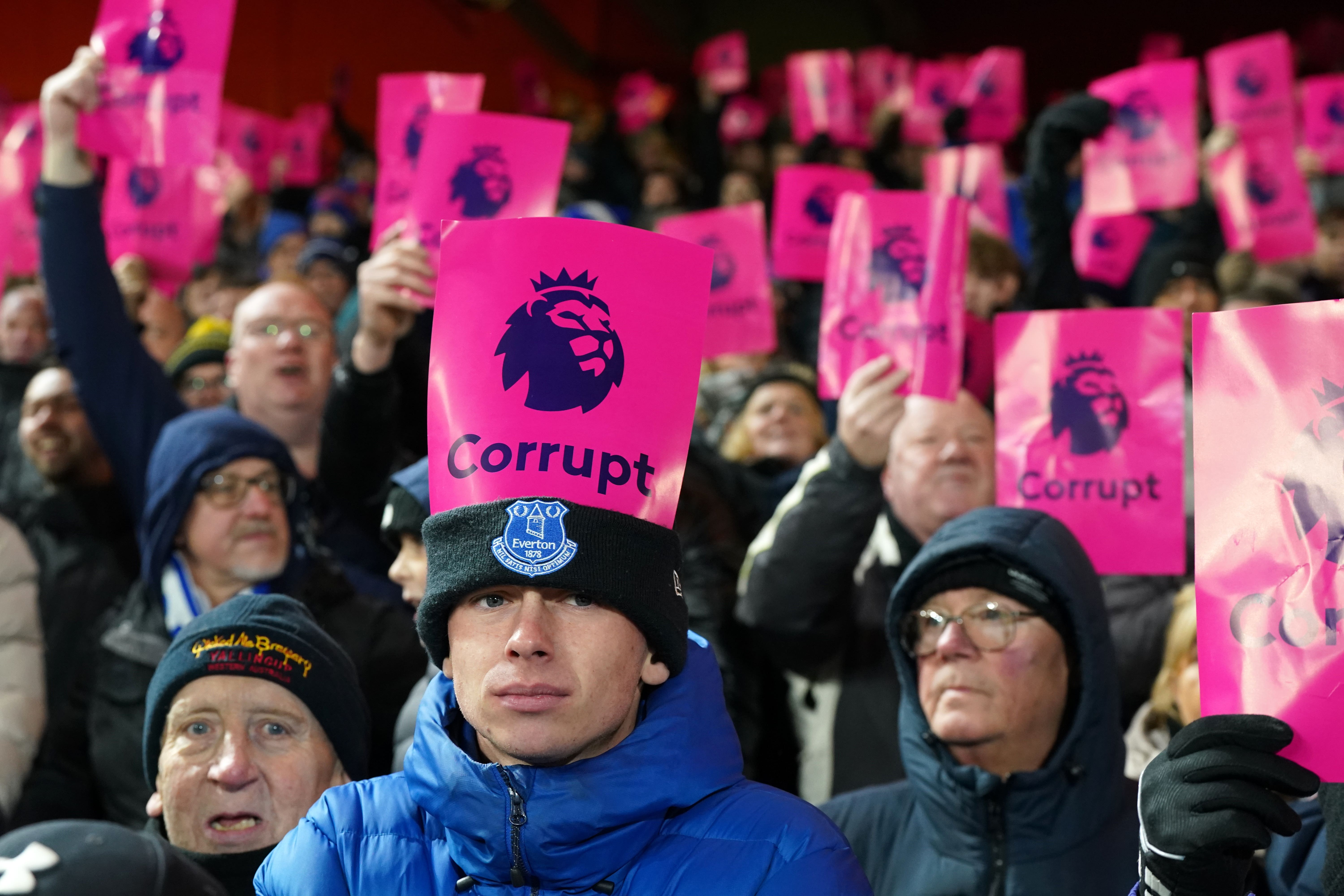 Everton fans protest against the Premier League after an independent commission docked them an initial 10 points for breaching the league’s financial rules (Nick Potts/PA)