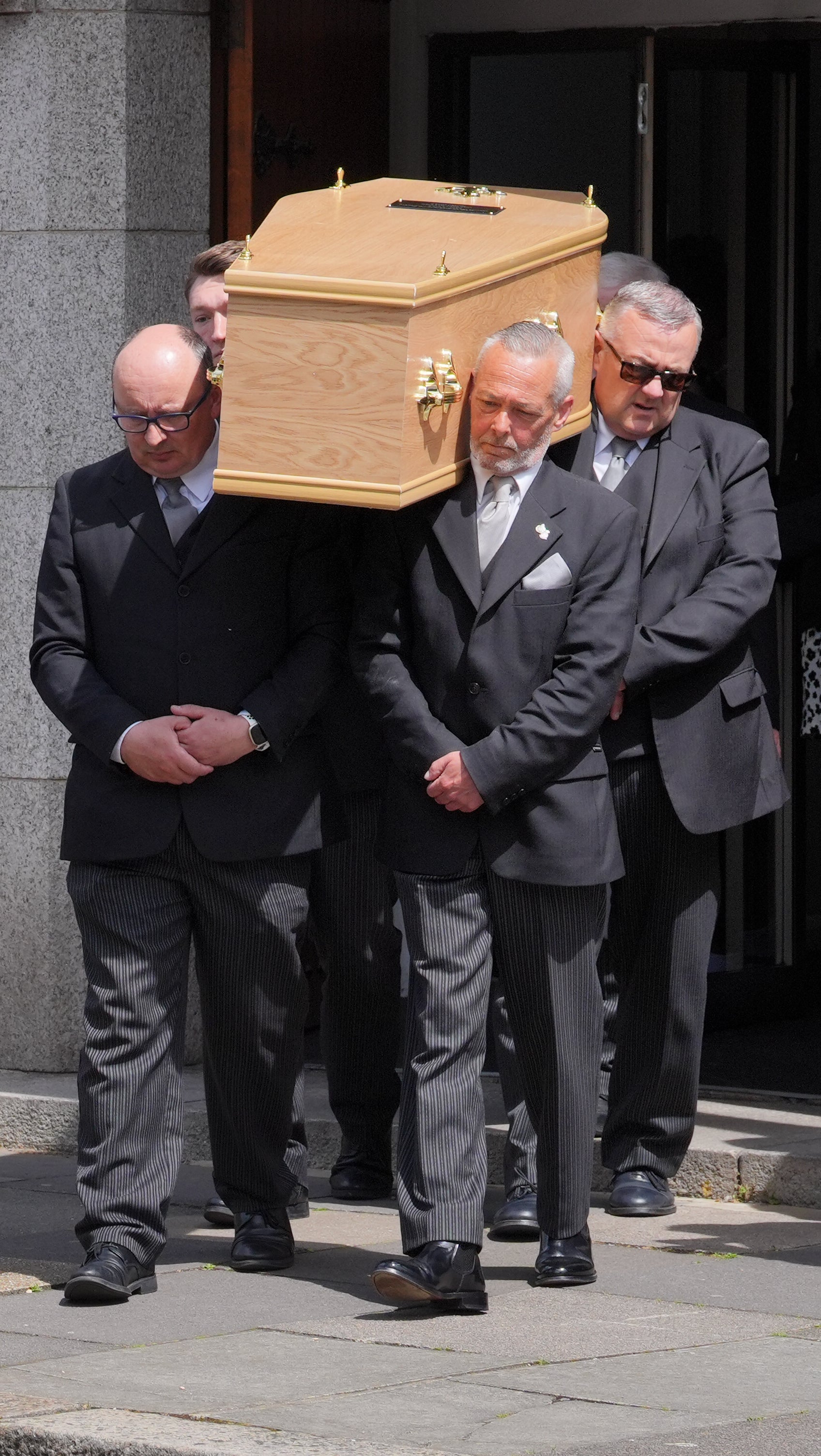 Daniel’s coffin being carried into the service