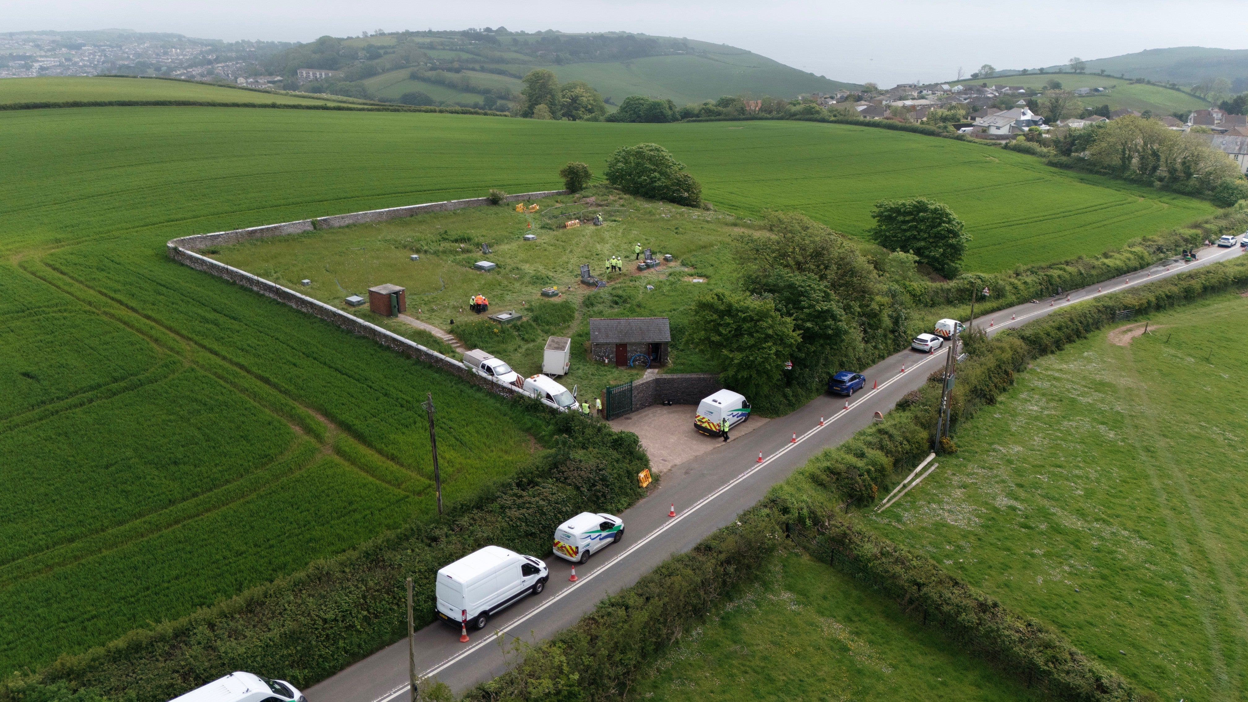 Workers at Hill Head reservoir in Devon