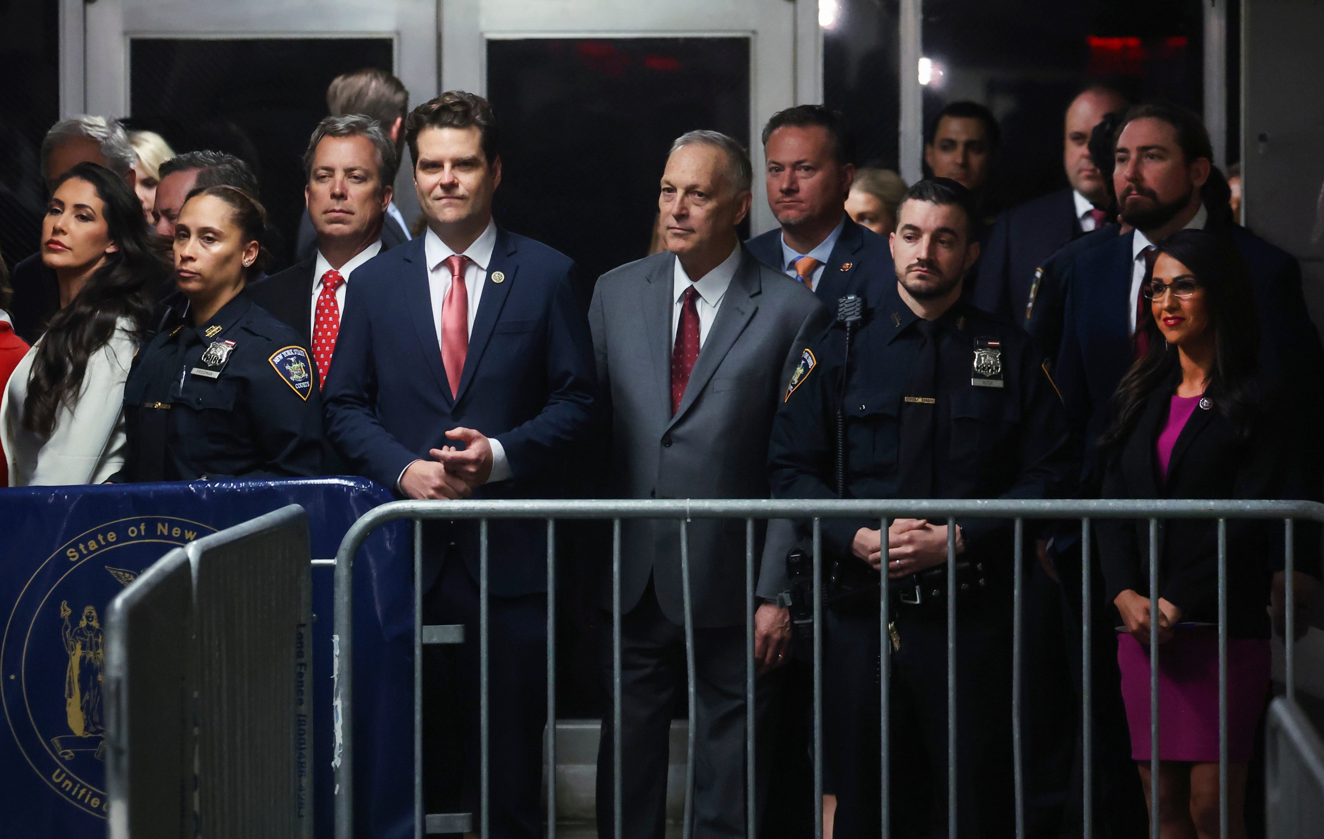 From left to right, Representatives Anna Paulina Luna, Andy Ogles, Matt Gaetz, Andy Biggs, and Lauren Boebert stand outside the Manhattan criminal court on Thursday to support Donald Trump at his hush money trial