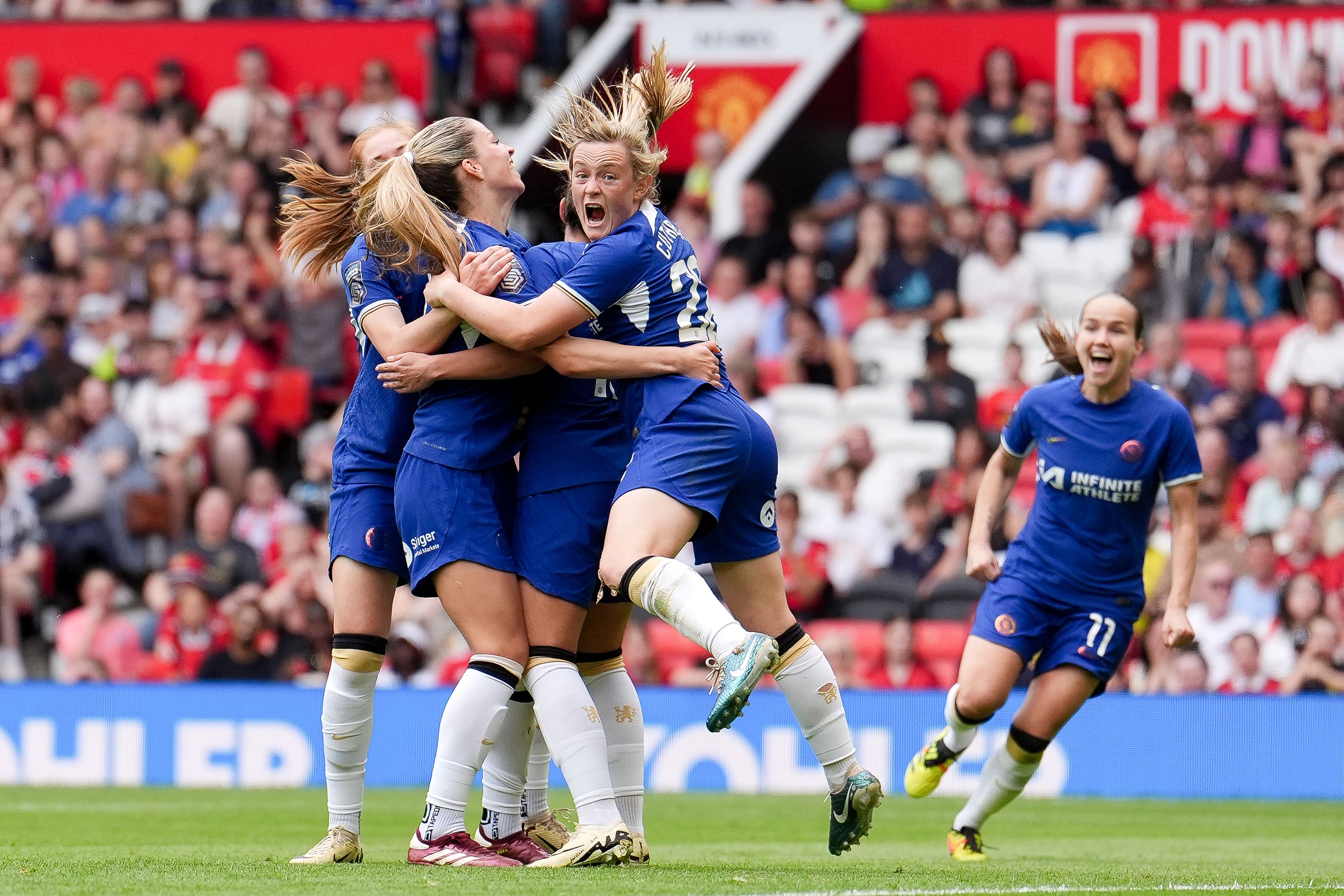 Chelsea’s Melanie Leupolz (second left) celebrates as her side clinched the WSL (Martin Rickett/PA)