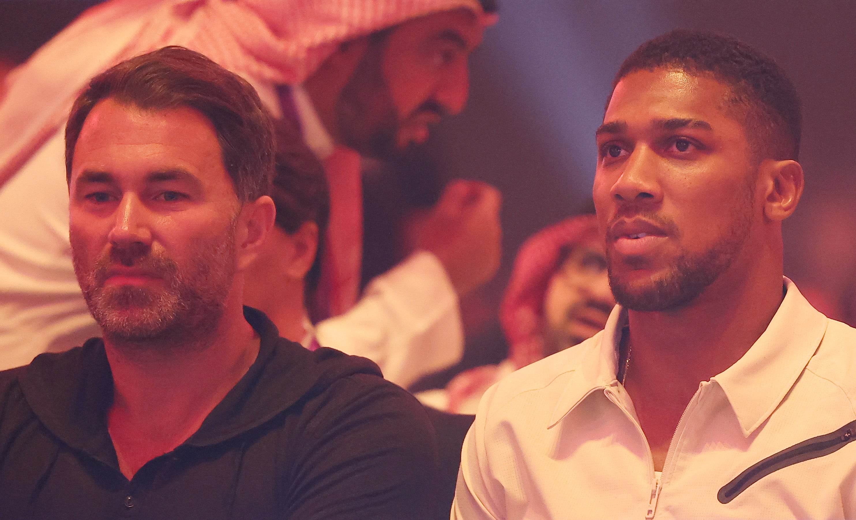 Hearn (left) with Joshua, watching Fury vs Usyk from ringside