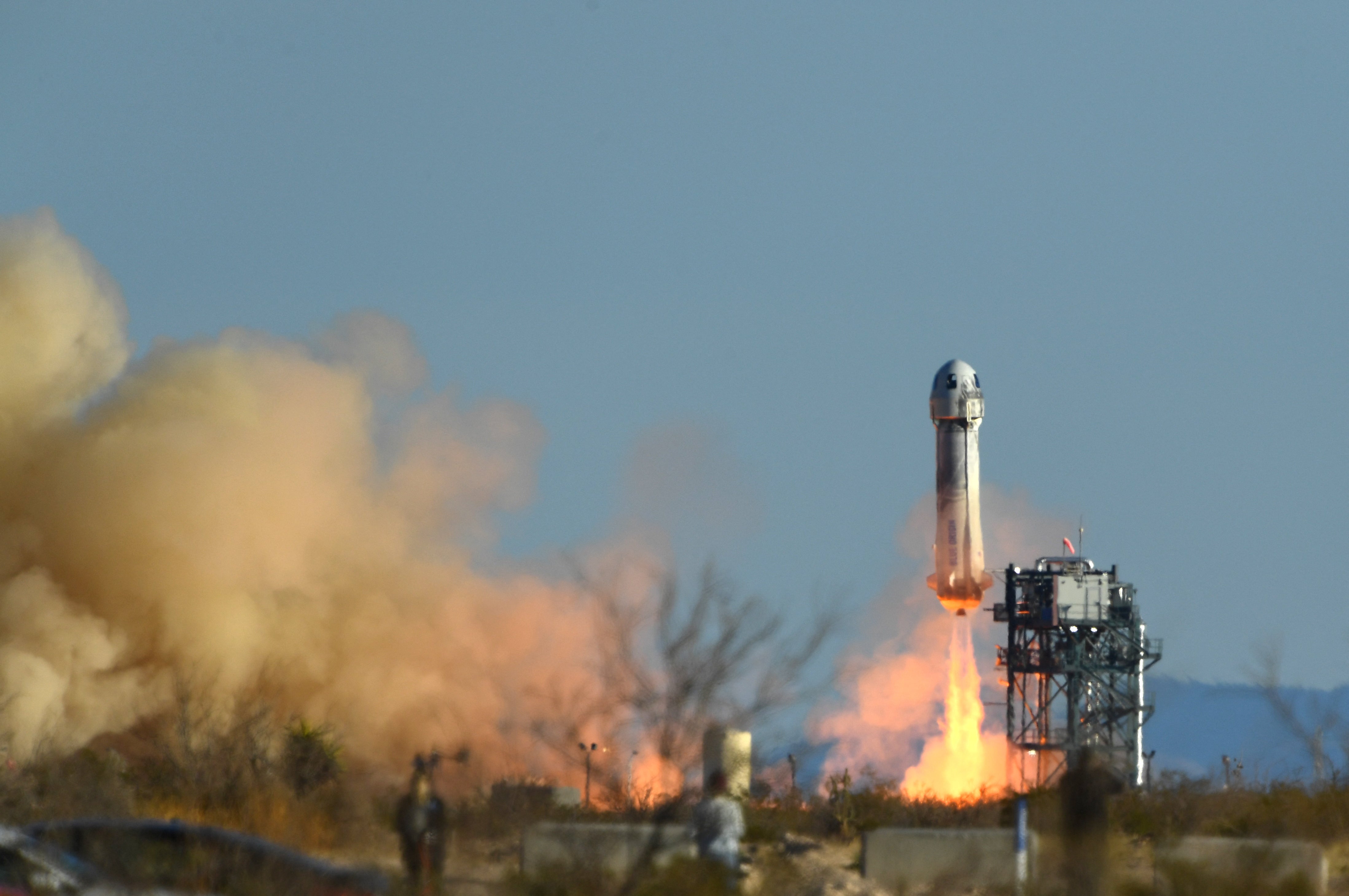 The Blue Origin New Shepard rocket pictured launching. Mr Dwight’s son and grandchildren will watch him take off in the aircraft on Sunday