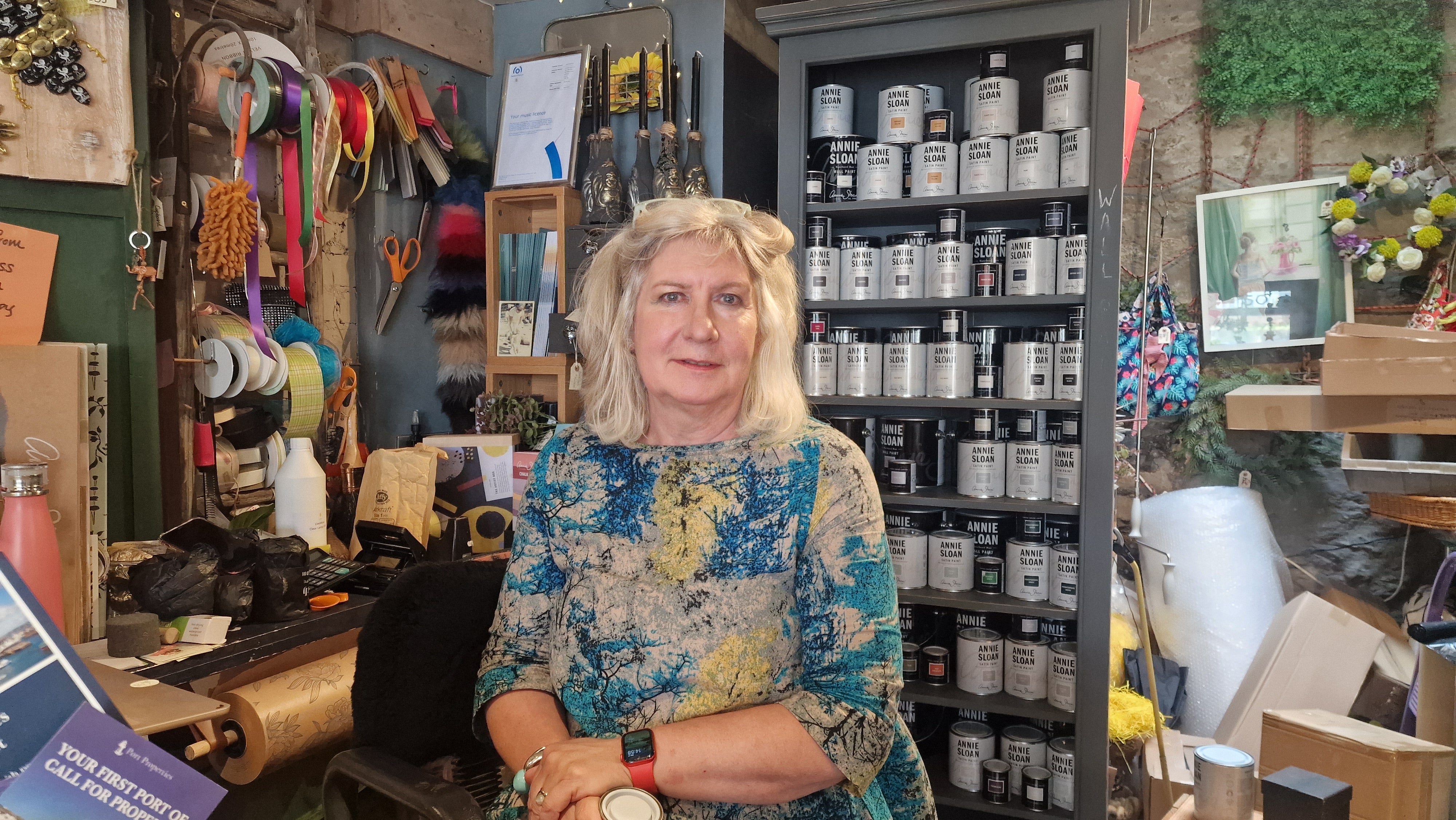 Sally Dart, who runs Topsom 50 near Brixham Harbour, a shop that sells artwork, furniture, and flowers.