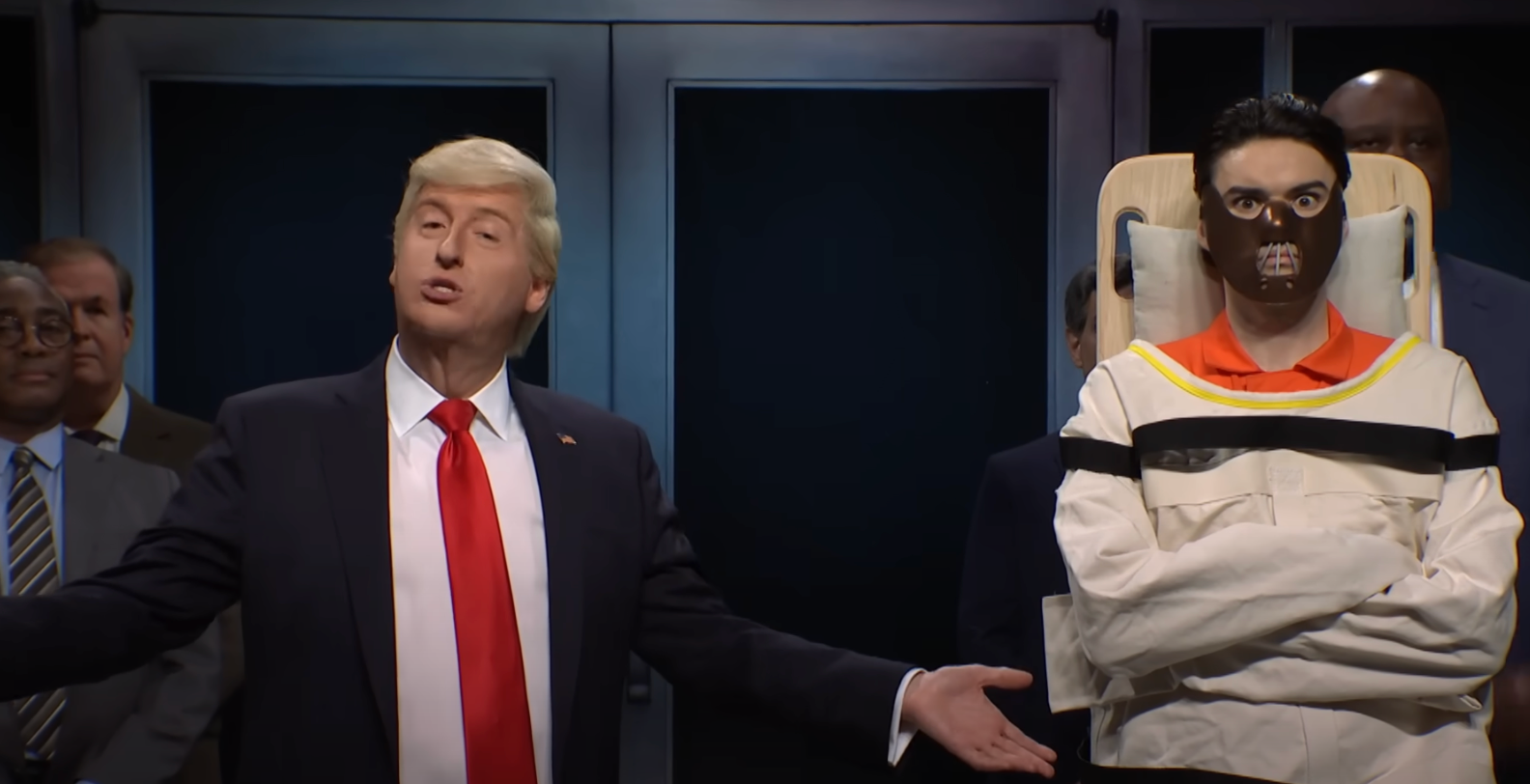 James Austin Johnson (left) stands dressed as Donald Trump next to Anthony Hopkins (right) dressed as Hannibal Lecter on a Saturday Night Live sketch mocking the former president’s vice presidential candidates