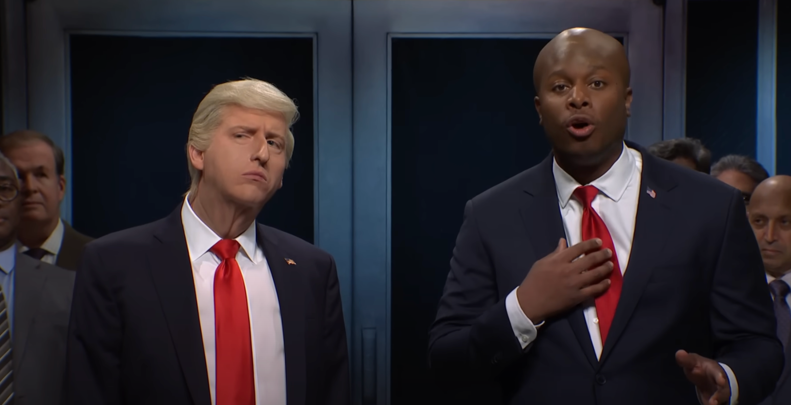 James Austin Johnson (left) dressed as Donald Trump stands next to Devon Walker (right) dressed as Senator Tim Scott