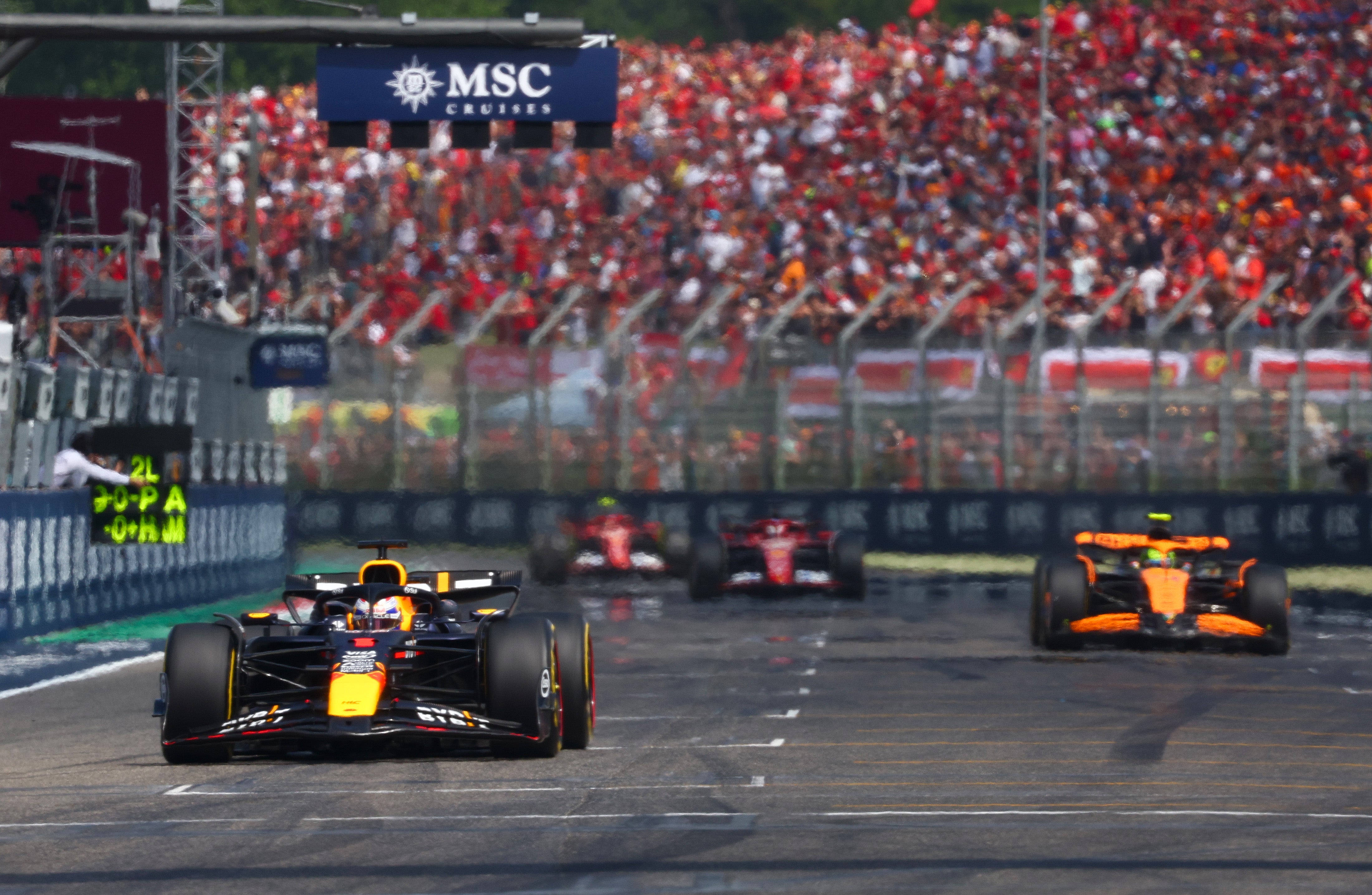 Max Verstappen held off Lando Norris to win in Imola