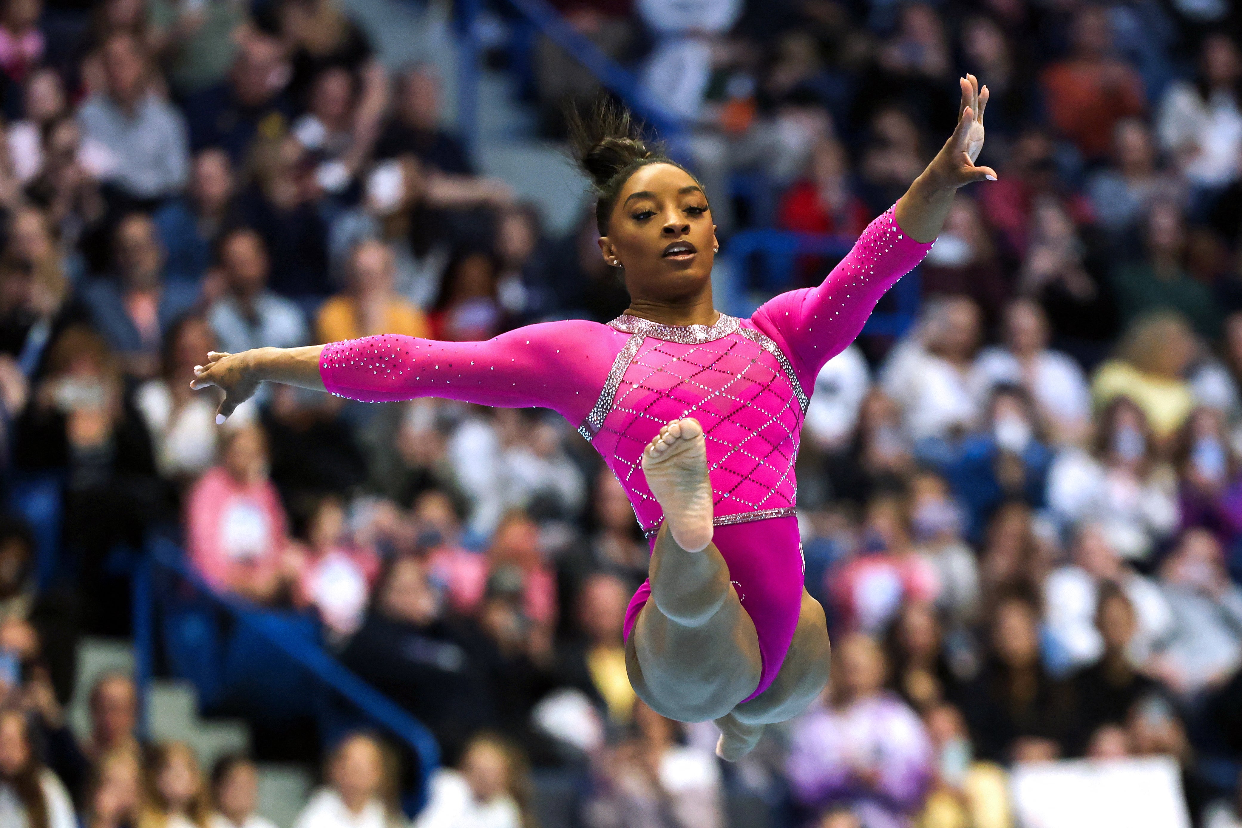 US gymnast Simone Biles competes in the floor event during the Core Hydration Classic at XL Center in Hartford, Connecticut