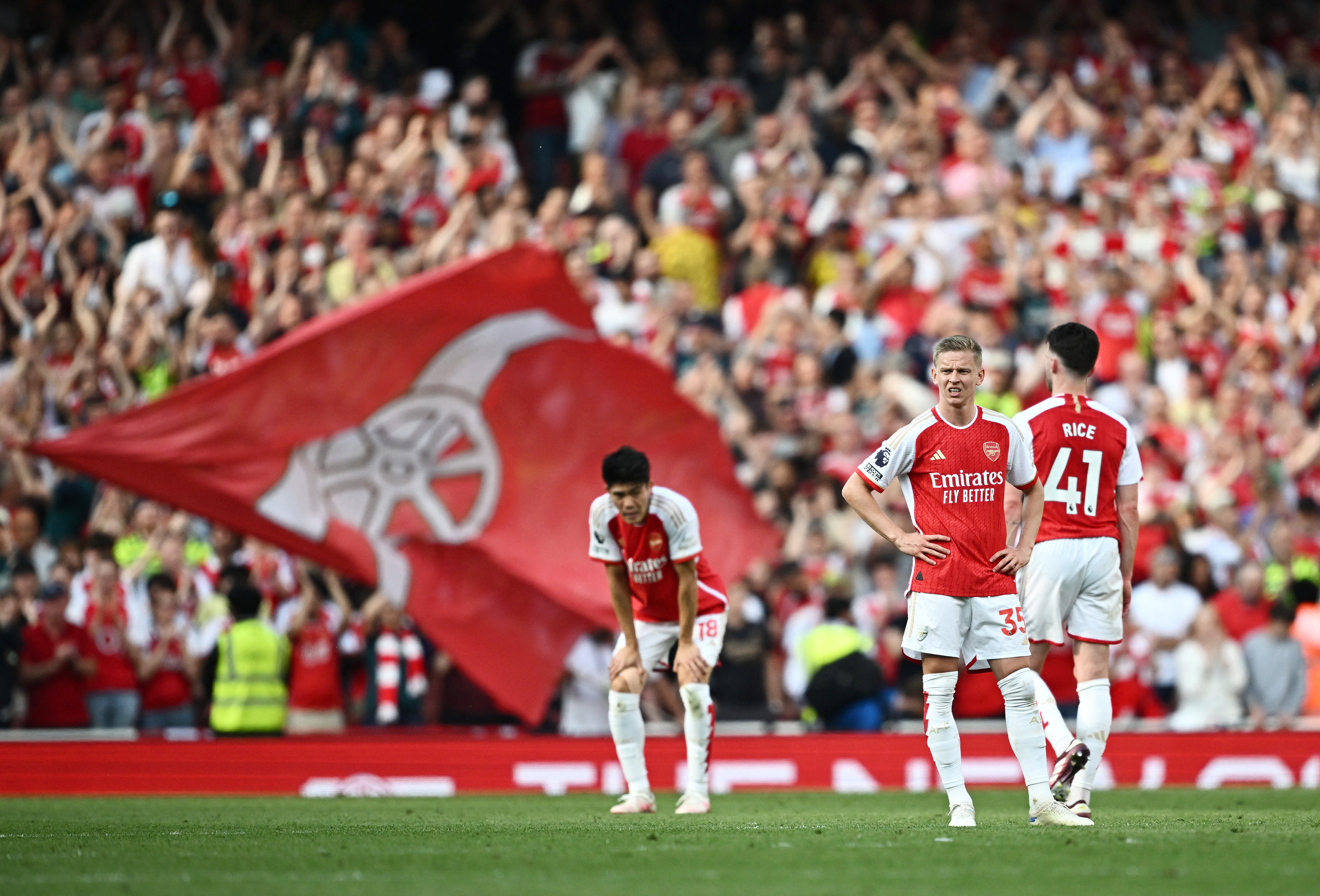 Despondent Arsenal players after the final whistle