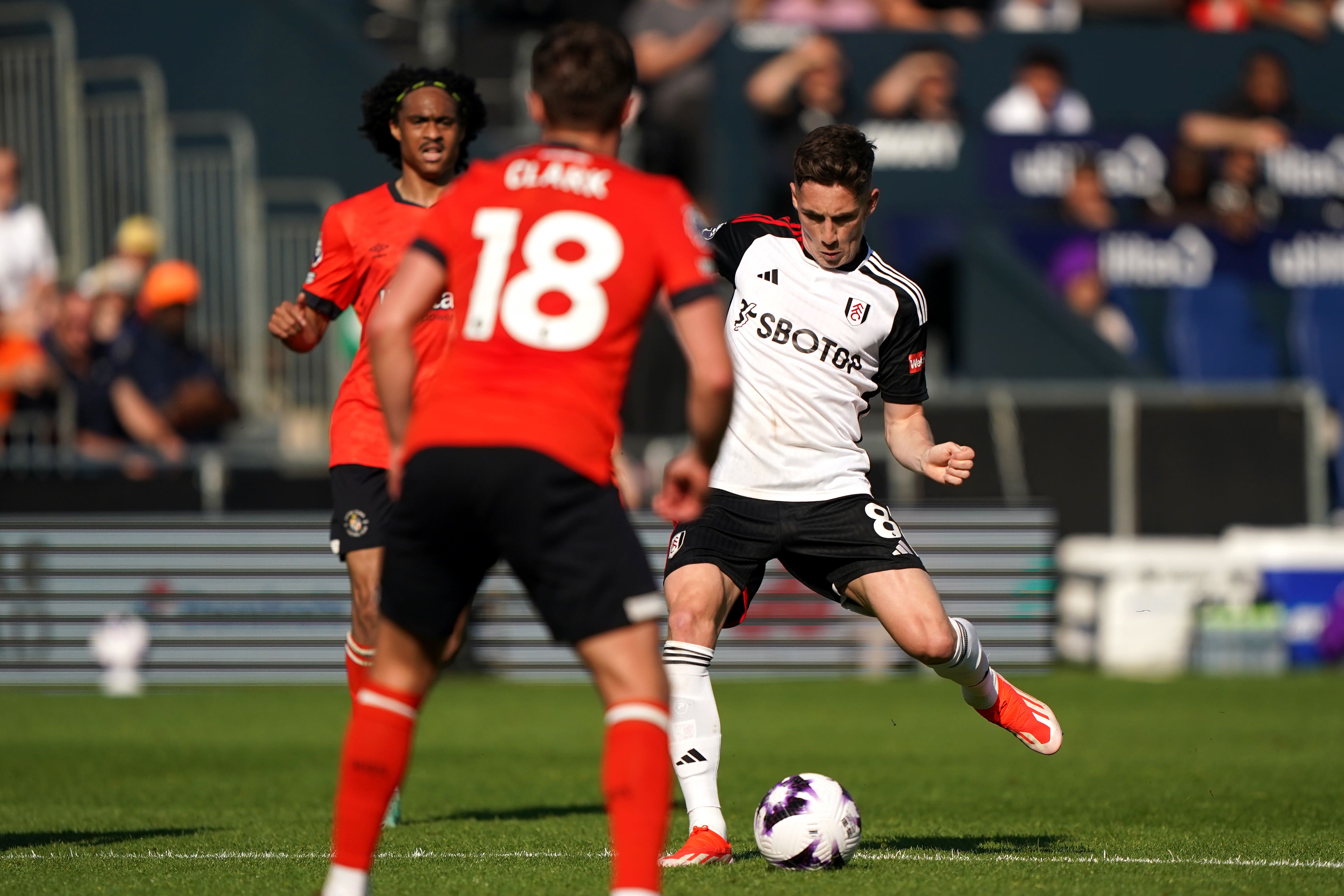 Harry Wilson scores Fulham’s fourth goal at Kenilworth Road (Joe Giddens/PA)