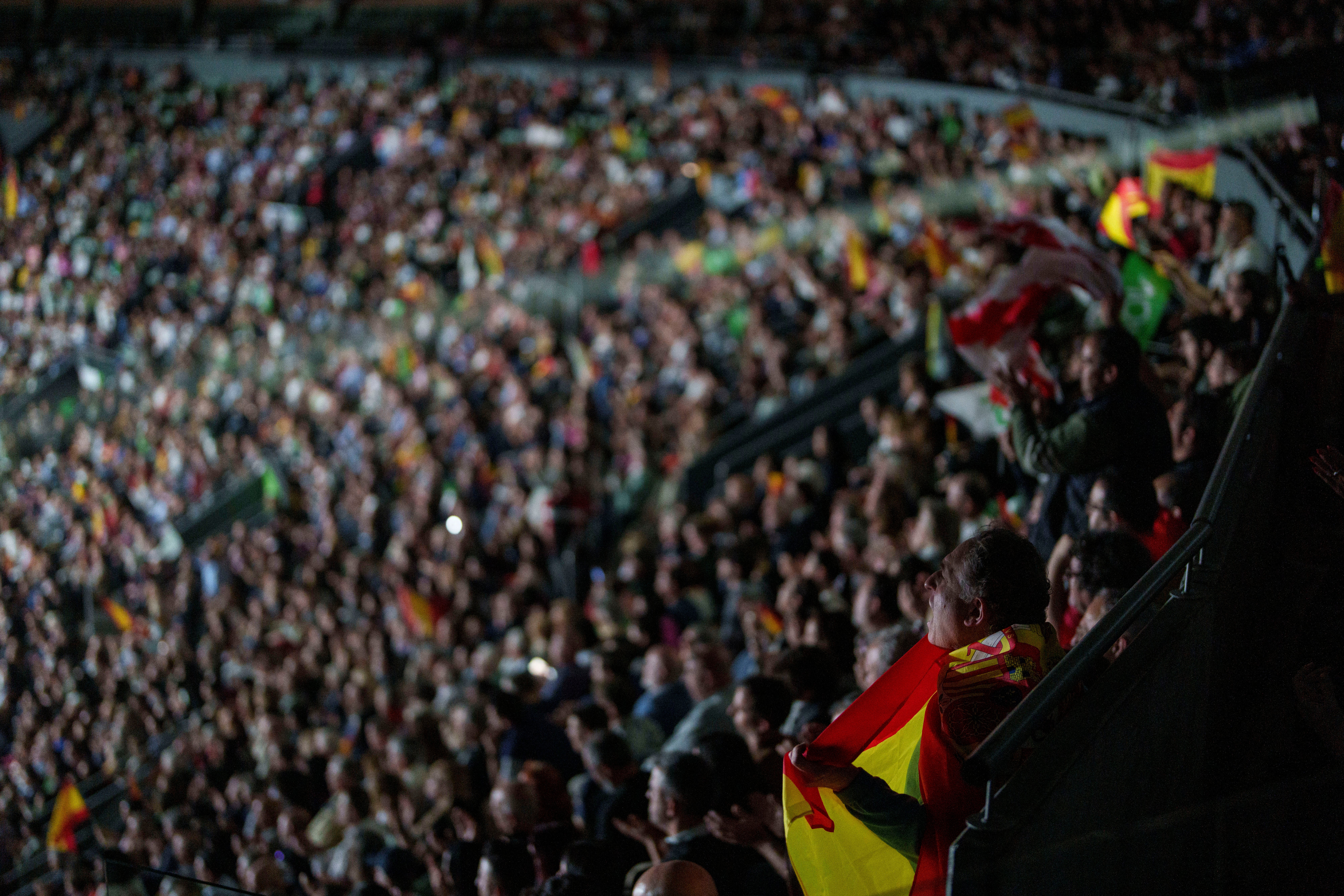 The Spanish far-right will pull out of power-sharing deals across the country in protest of national migration policy. Pictured: Vox Party supporters in May