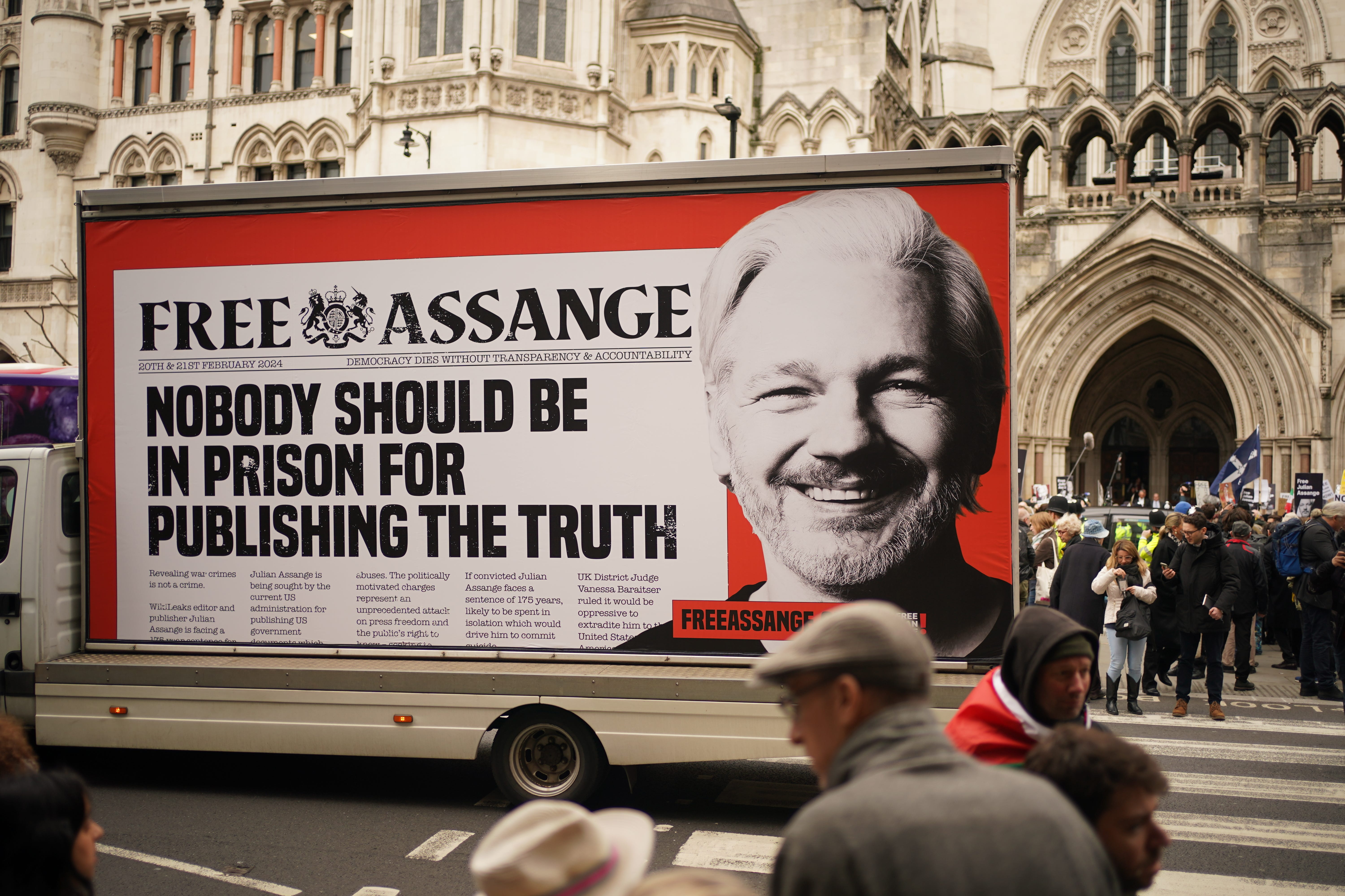 Supporters outside the Royal Courts of Justice during the two-day hearing in the extradition case of WikiLeaks founder Julian Assange (PA)