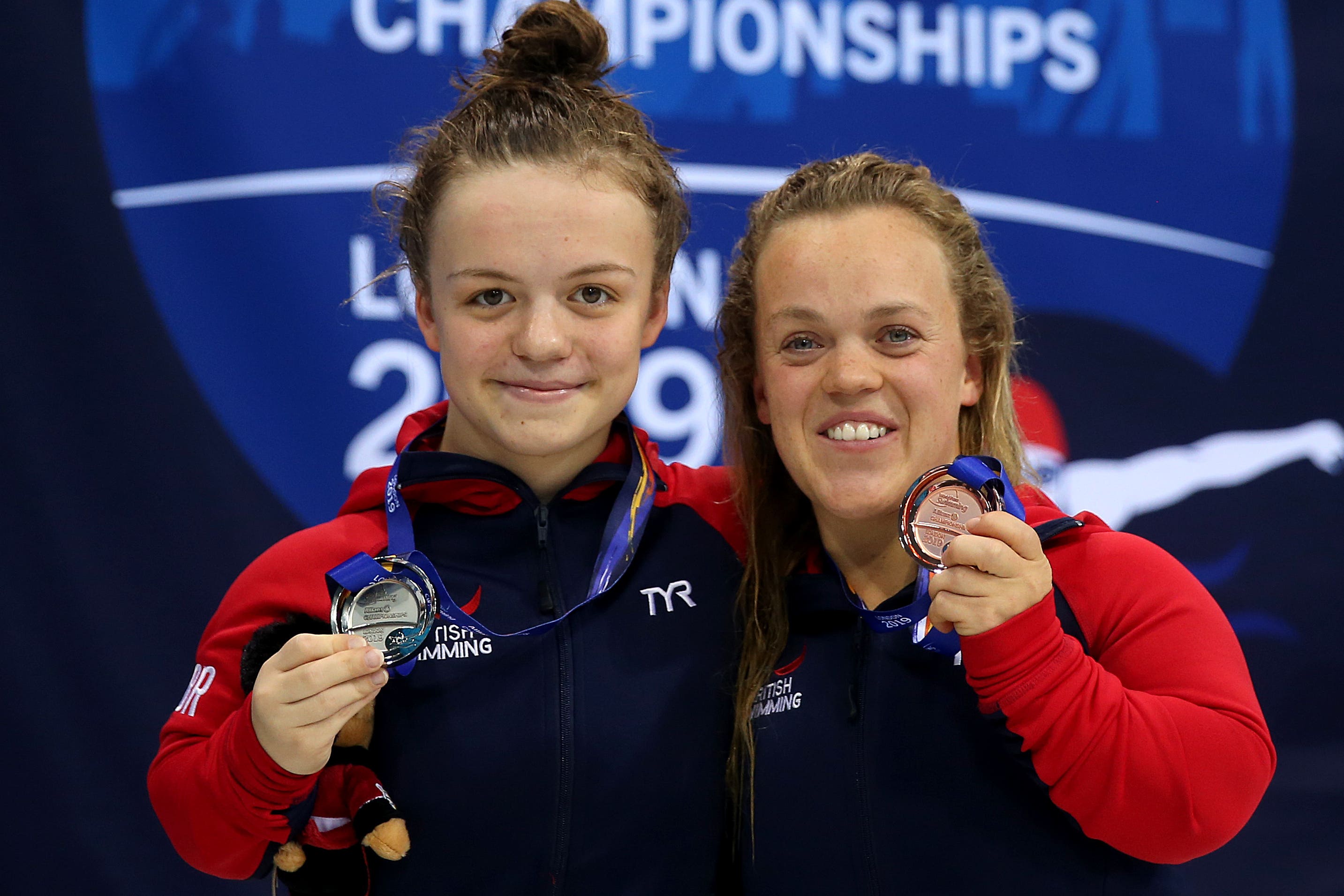 Maisie Summers-Newton, left, outshone Ellie Simmonds, right, three years ago in Tokyo (Steven Paston/PA)