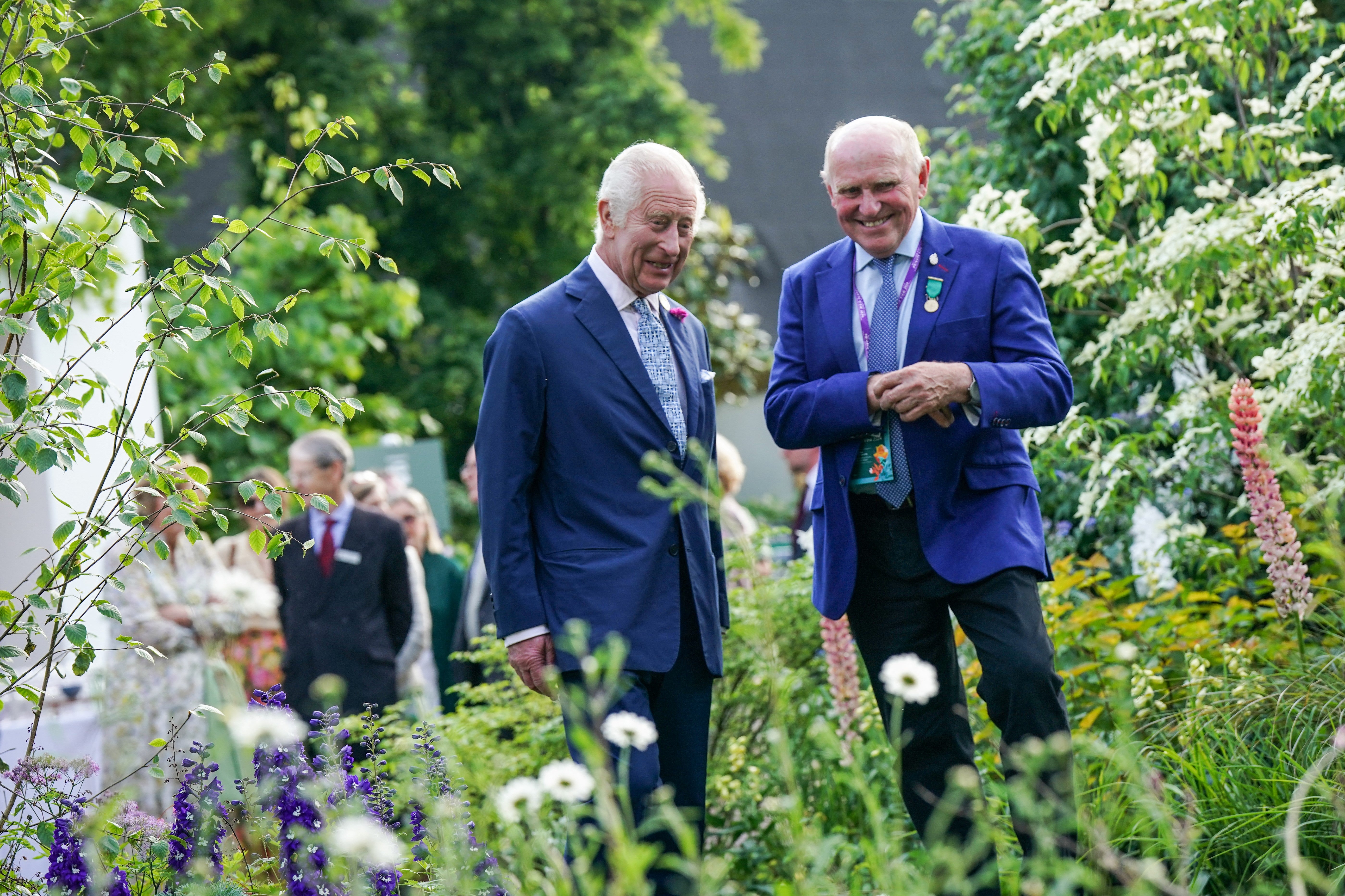 Britain's King Charles III (L) visits the 2024 RHS Chelsea Flower Show, in London, on May 20, 2024