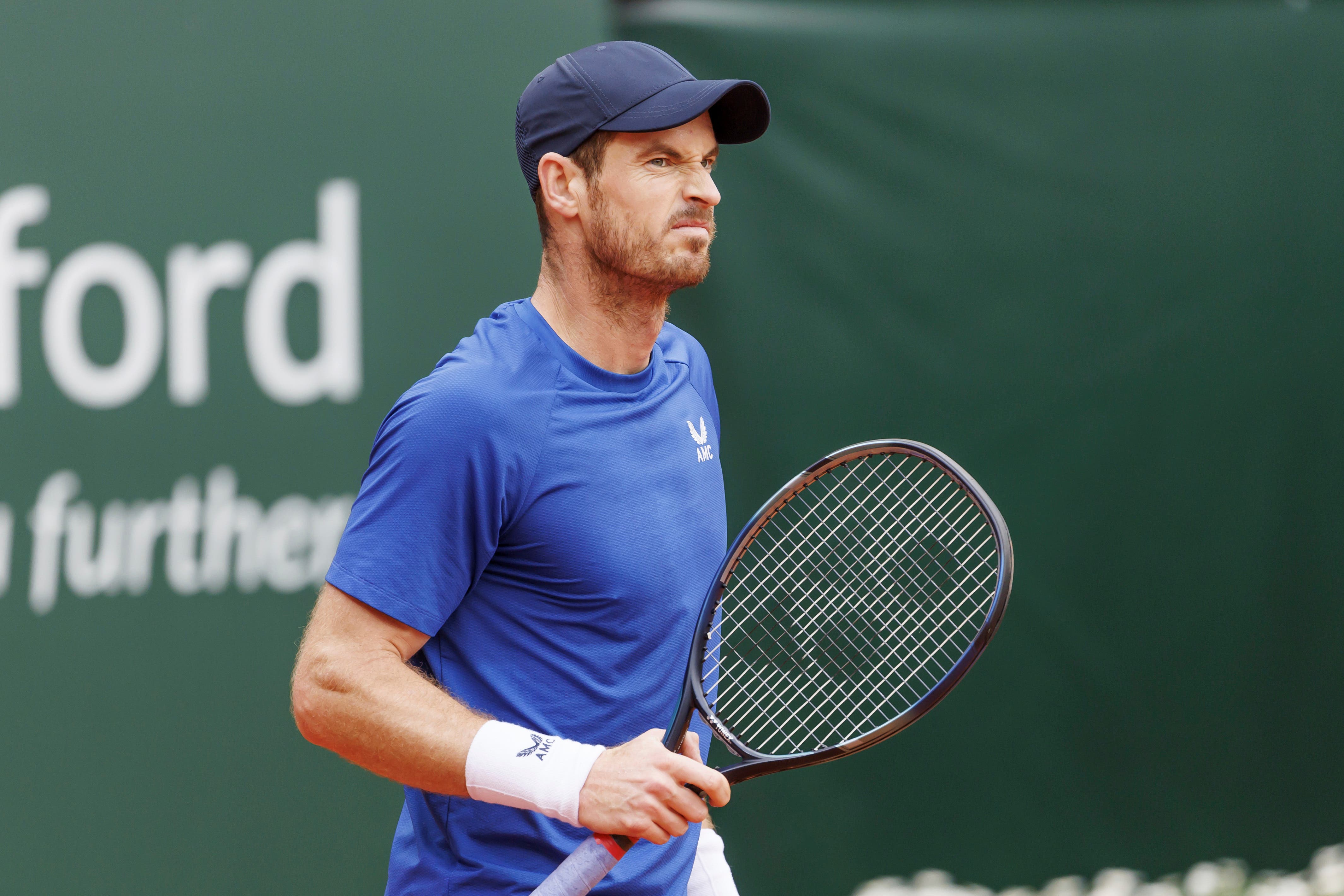 Andy Murray was less than impressed with weather conditions in Geneva (Salvatore Di Nolfi/AP)