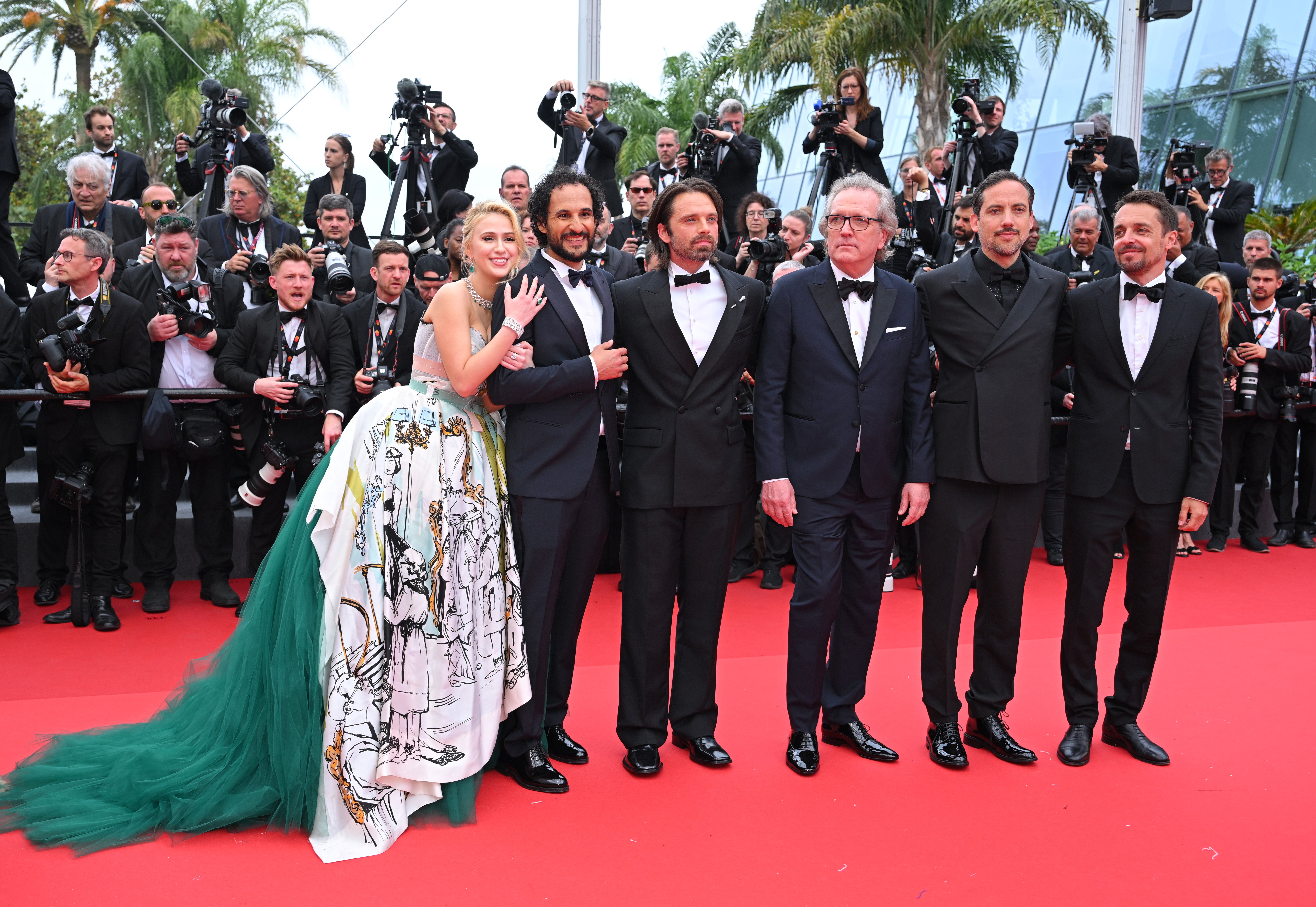 Maria Bakalova, Ali Abbasi, Sebastian Stan, Martin Donovan, Daniel Bekerman and Jacob Jarek attend the ’The Apprentice’ Red Carpet at the 77th annual Cannes Film Festival on 20 May 2024