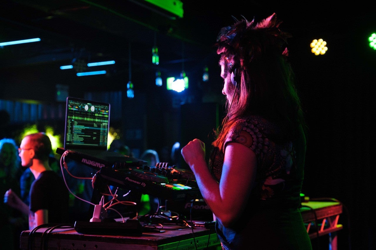 A sound technician works during a Don Letts performance at the Old Bakery Studios