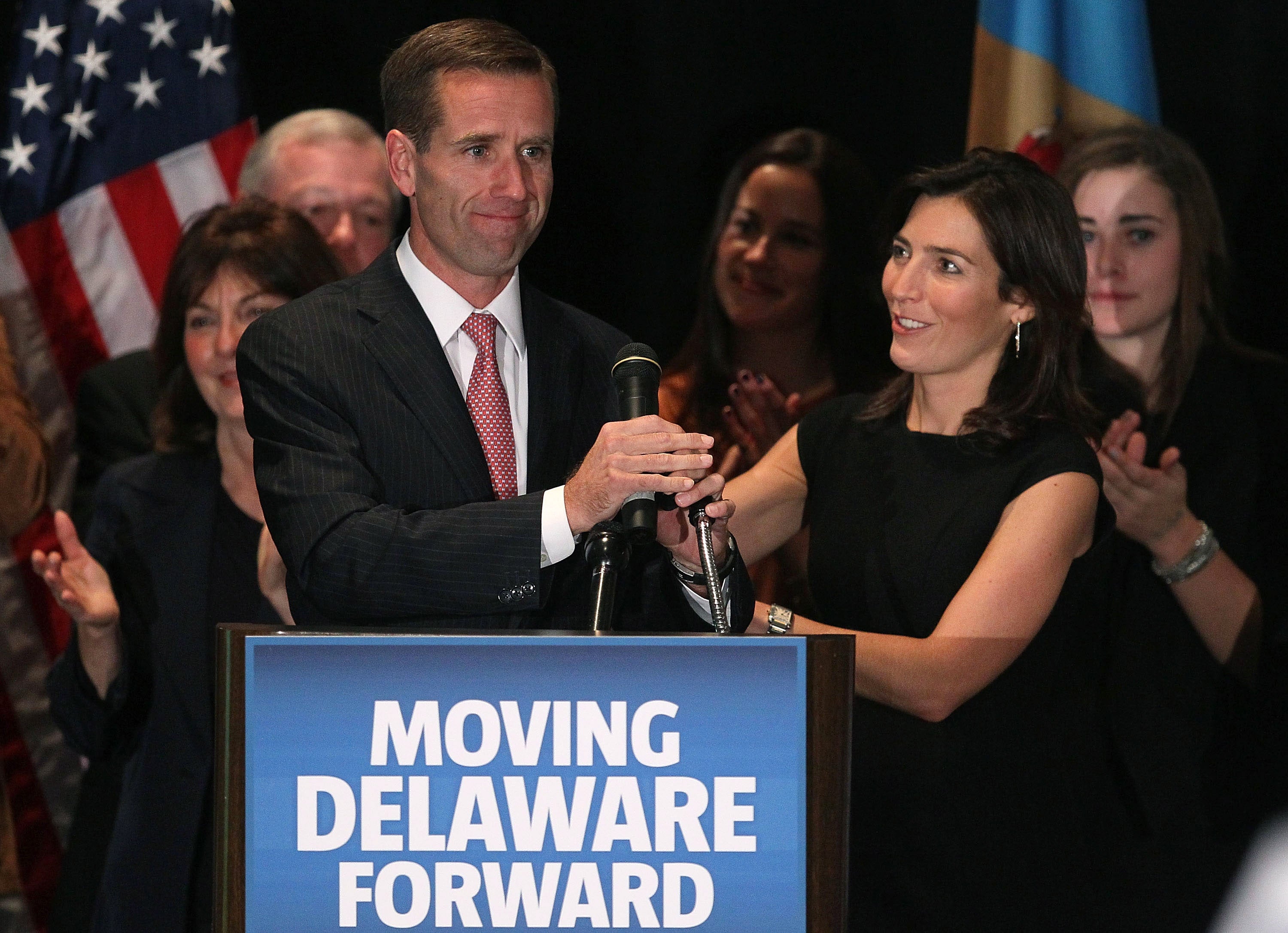 Beau Biden (left) celebrates with wife Hallie Biden (right) in November 2010